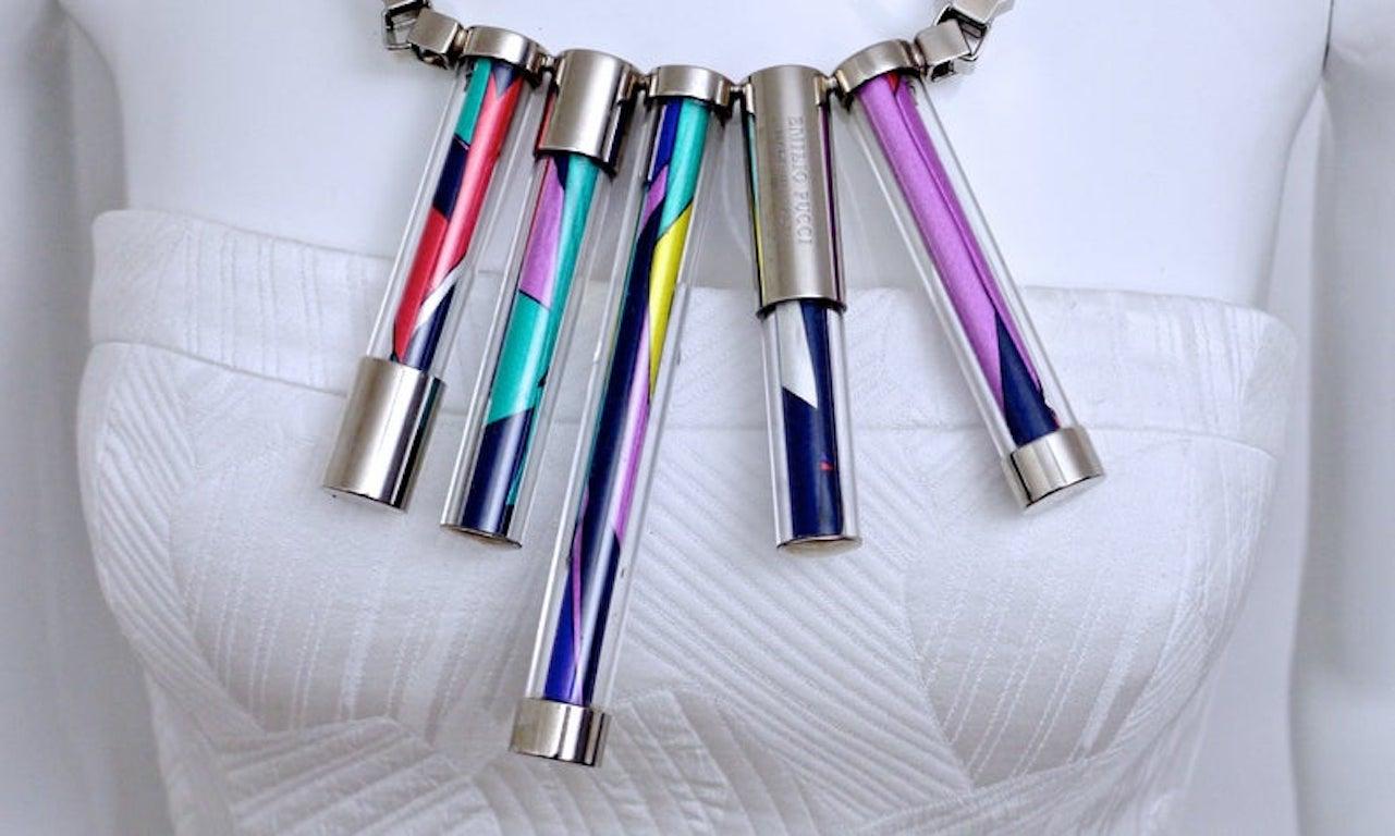 Vintage EMILIO PUCCI Futuristic Silk Abstarct Tube Necklace

Measurement:
Abstract Tubes: 5 inches  X  5/8 inch  (longest)
                          3 4/8 inches  X  5/8 inch  (shortest)

Wearable Length: 24 inches until 25 4/8 inches  

This