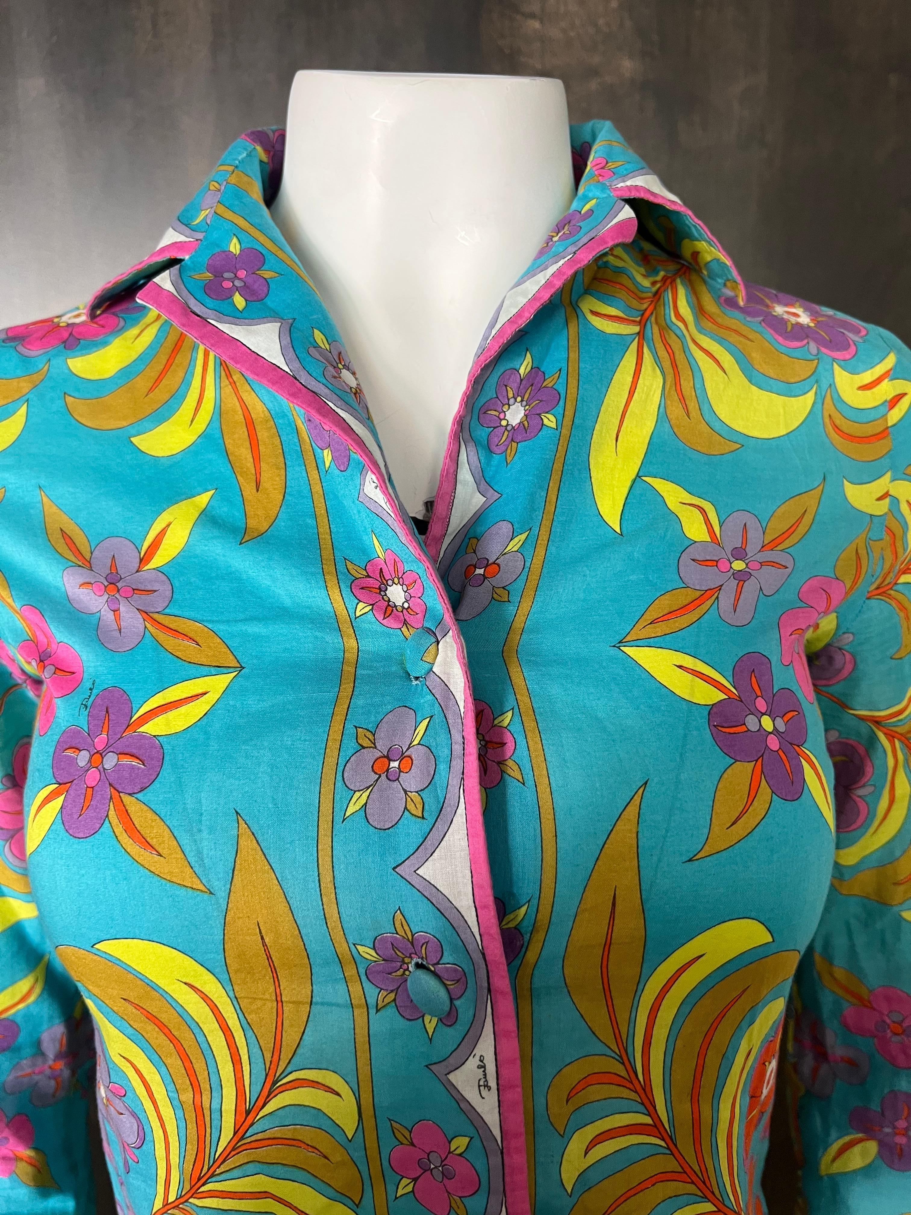- Featuring blue, pink, purple, yellow, orange colors
- 100% cotton
- Floral motif pattern
- Long sleeves
- Collar
- Front button closure
- Fits XS/S
