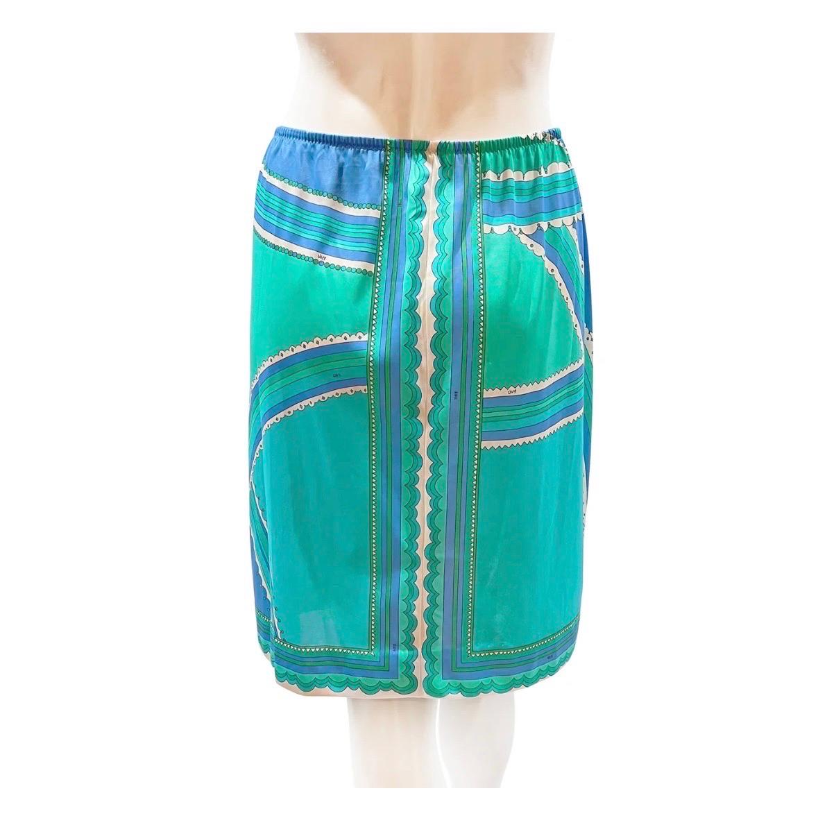 Slip skirt by Emilio Pucci for Formfit Rogers
Made in U.S.A
Aqua, green, periwinkle and white geometric print
Elastic waist 
Just above knee-length 
100% nylon
Condition: Great, zero visible wear. 
Size/Measurements:
Size Medium 
25