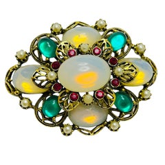 Spilla vintage firmata EMMONS con strass in tonalità oro e cabs di design