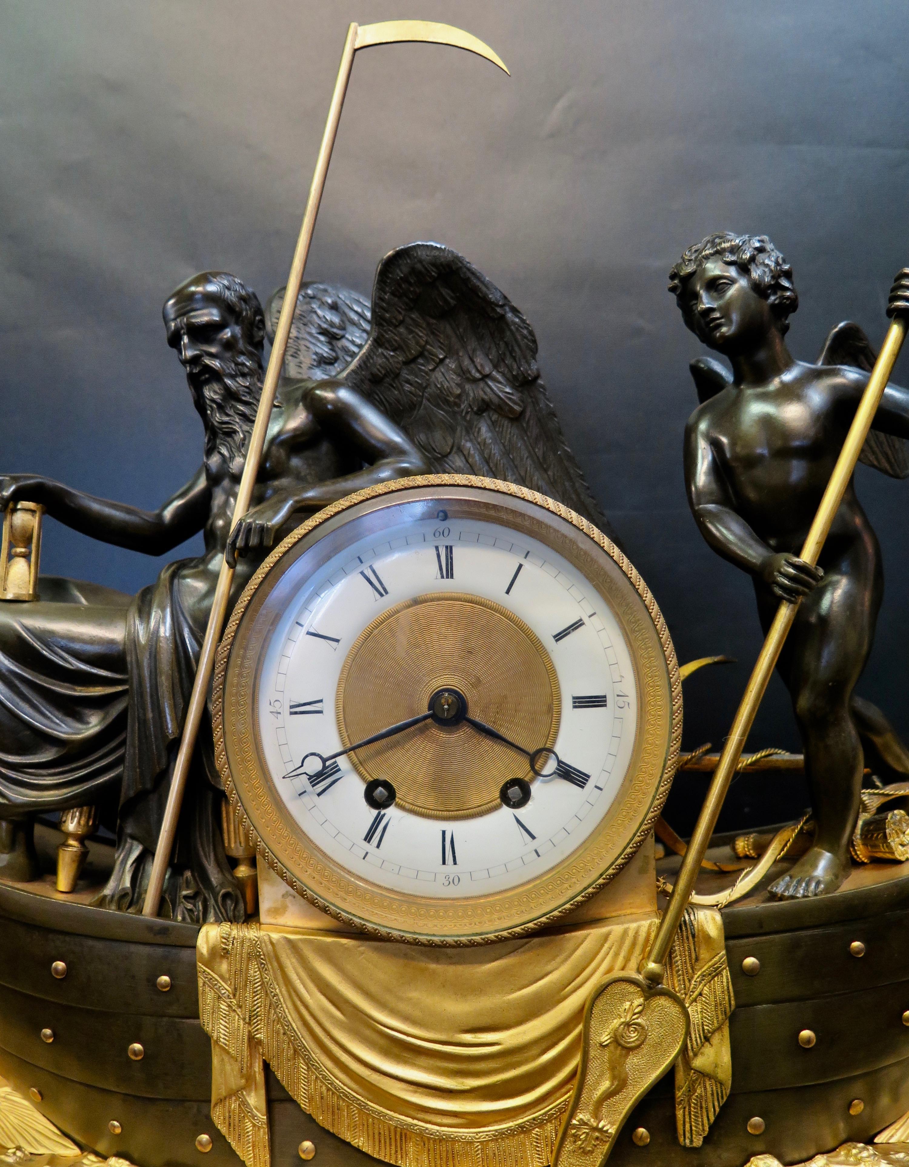 This vintage sculpted bronze and marble clock dates from the mid-19th century (Empire Period). It is elaborately decorated with an exceptional depiction of 