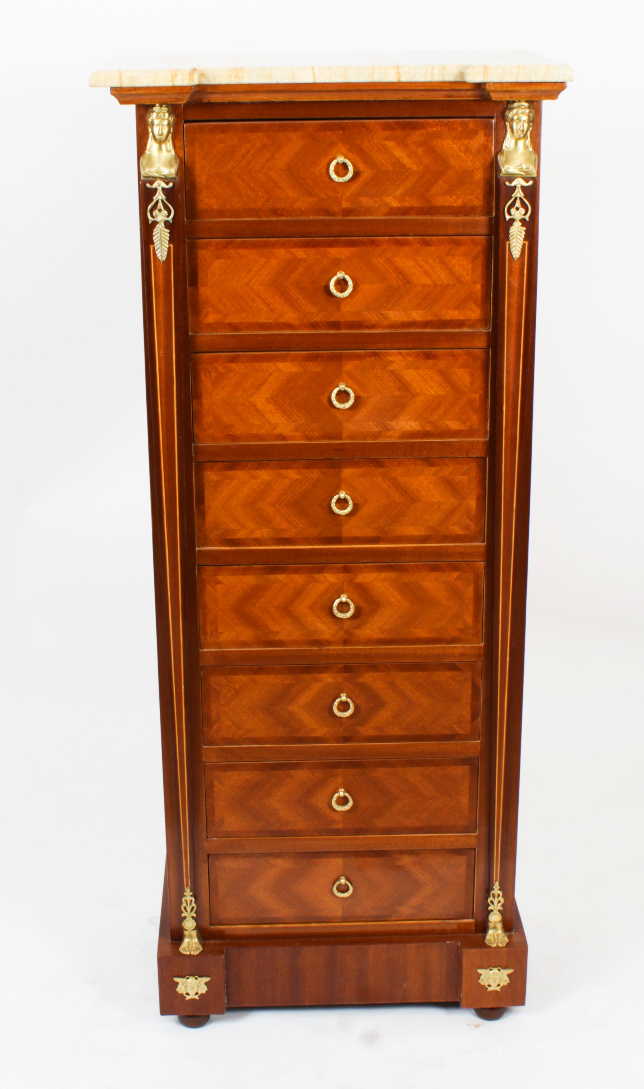 This is a beautiful vintage Empire Revival maple and walnut marble topped chest, late 20th Century in date.

This stunning chest features a beautiful cream marble top and attractive ormolu mounts with eight drawers.

Add a touch of unparalleled