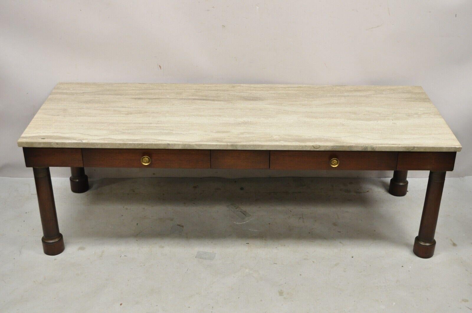 Vintage Empire Style Custom Mahogany Marble Top Coffee Table with 2 Drawers. Item features round column form legs, rectangular travertine/marble top, quality craftsmanship, great style and form. Circa Mid 20th Century. Measurements: 19