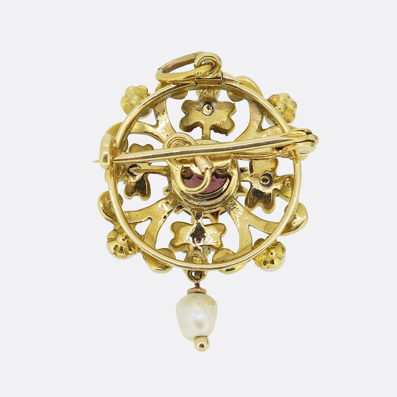 This is a truly wonderful Art Nouveau style 18ct yellow gold natural pearl, amethyst, diamond and enamel pendant. The highly decorated, iconic Art Nouveau frame has a floriated design, composed of beautifully enamelled leaves. The enamel is in