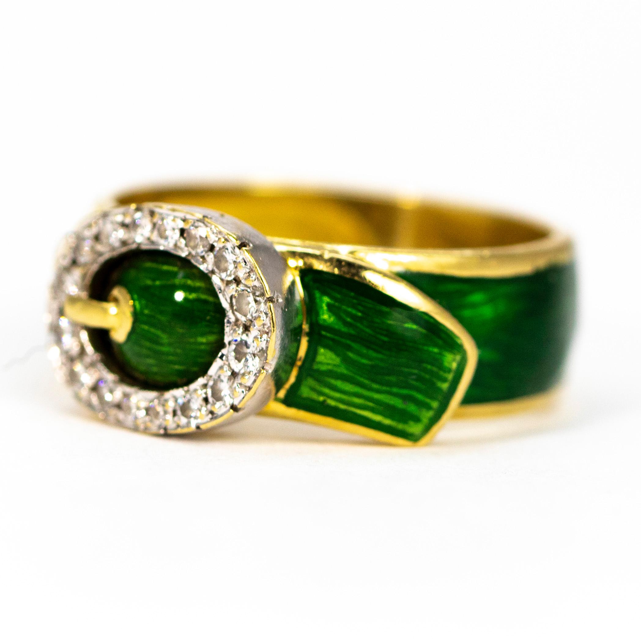 This show stopping piece features bright shimmering green enamel which is complemented perfectly against the 18ct gold. The buckle itself is set with a halo of diamonds which add a lovely sparkle!

Ring Size: N or 6 3/4
Band Width: 14mm

Weight: