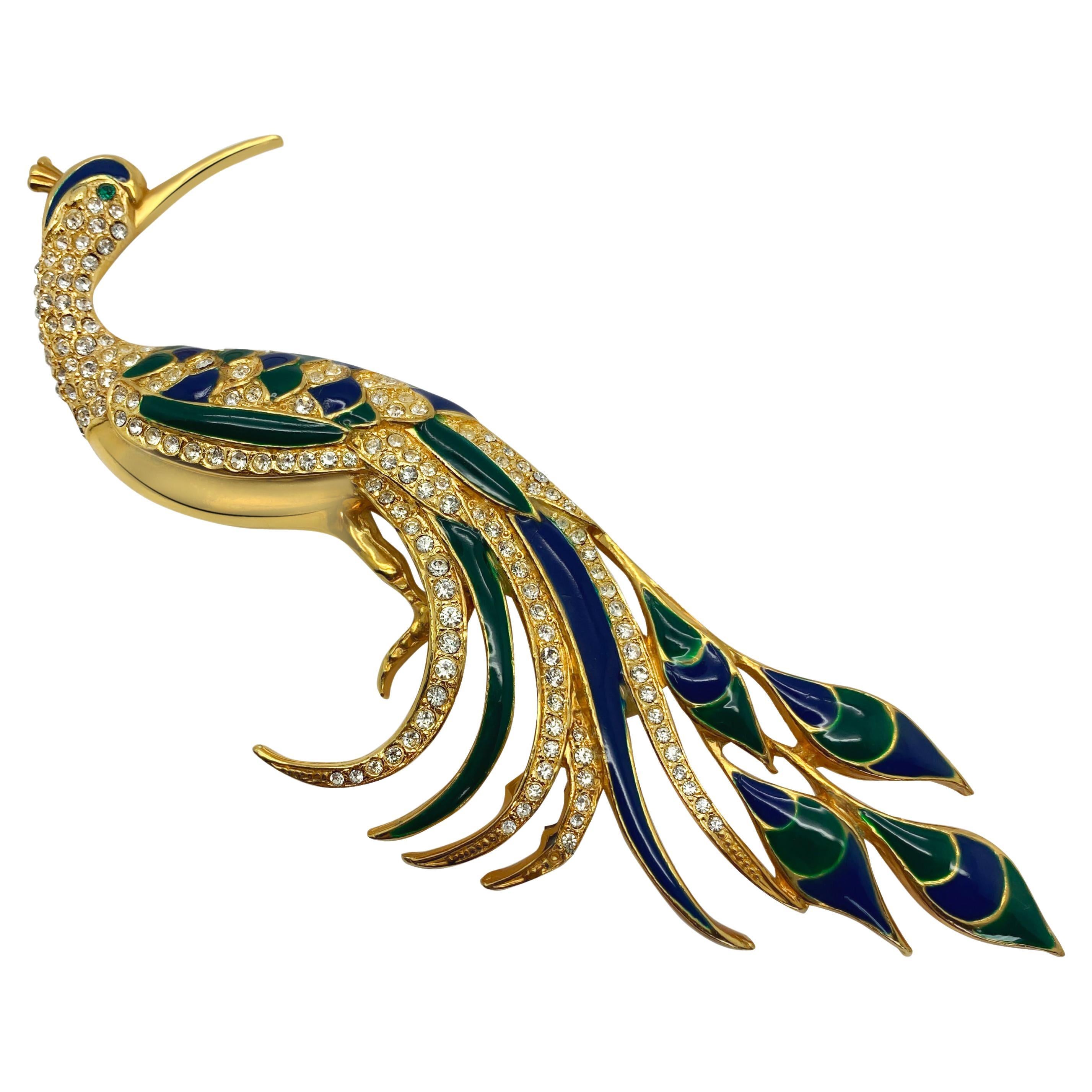 A magnificent Vintage Bird of Paradise Brooch. Featuring glorious enamelling with pave set rhinestones in a lustrous gold mount. 
Vintage Condition: Very good overall vintage condition with a couple of tiny areas of plate creasing/lift on the