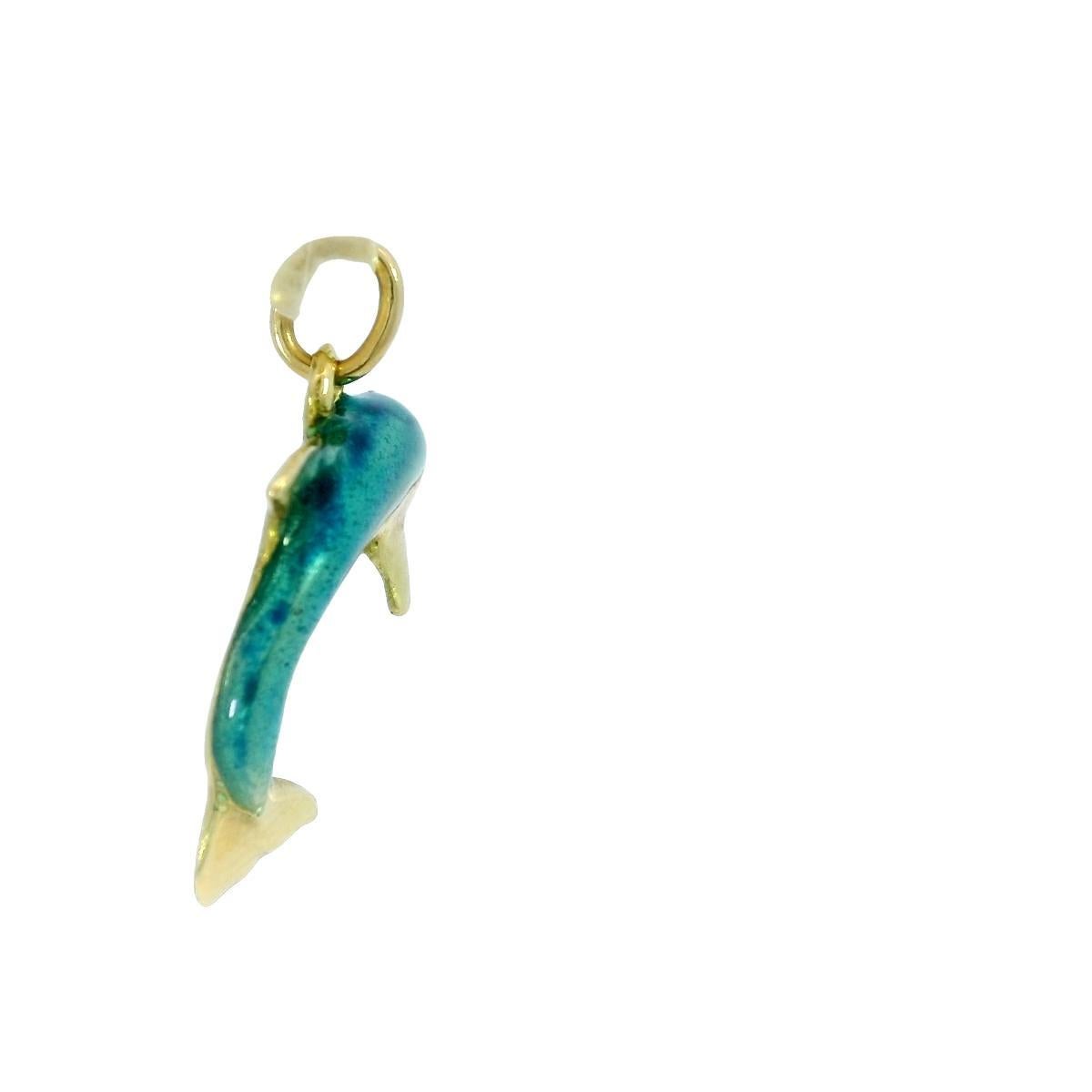 Vintage Enamel Dolphin Charm Pendant 18 Karat Yellow Gold

This Vintage 18 Karat Dolphin Charm Pendant is a delightful piece that adds a touch of whimsy to any jewelry collection. Made in 18K yellow gold, the pendant features a playful dolphin with