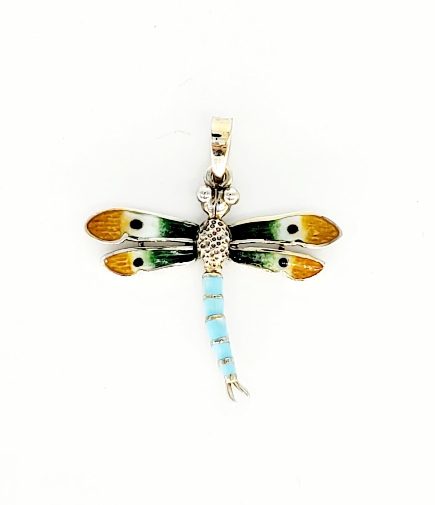 Vintage Enameled Turquoise Dragonfly Pendant. The pendant measures 1.15”x1.23” and weights 2.9 grams.