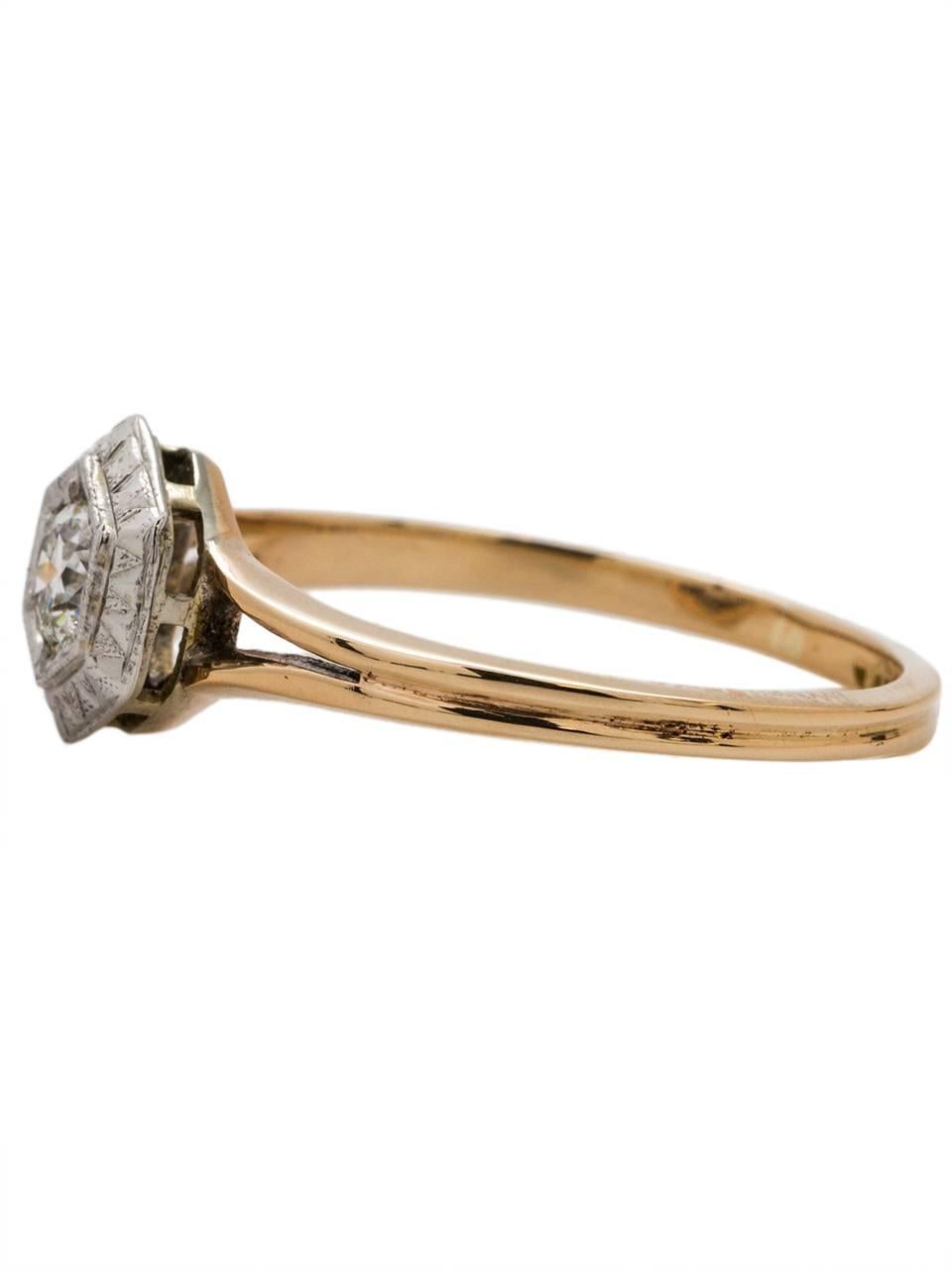 
Lovely vintage diamond engagement ring featuring a bright and lively 0.40ct Old European Cut, H-SI1. The center stone is accented by a finely engraved hexagonal bezel setting and split design. Would be fabulous paired with one of our vintage