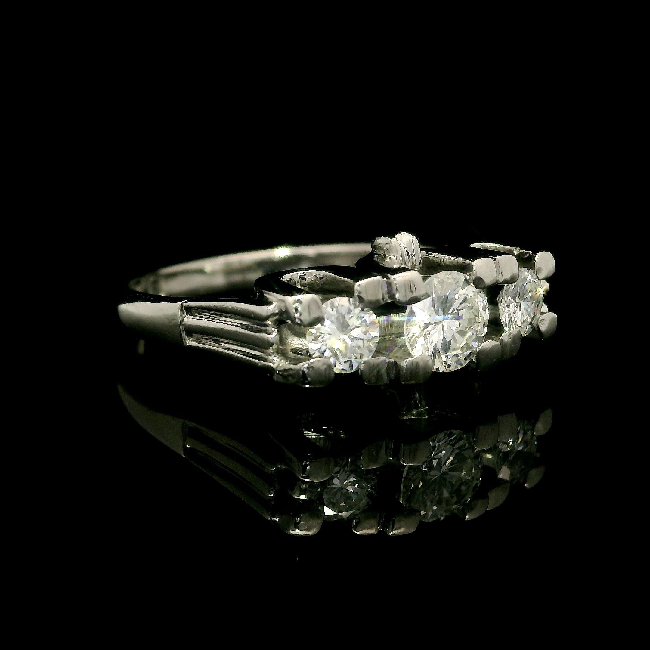 Brilliant Cut Vintage English 18k White Gold 0.72ctw Round Cut Diamond 3 Stone Ring For Sale