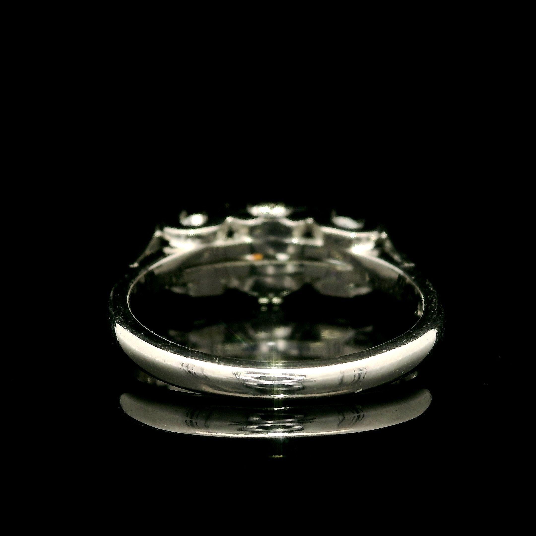 Vintage English 18k White Gold 0.72ctw Round Cut Diamond 3 Stone Ring For Sale 1