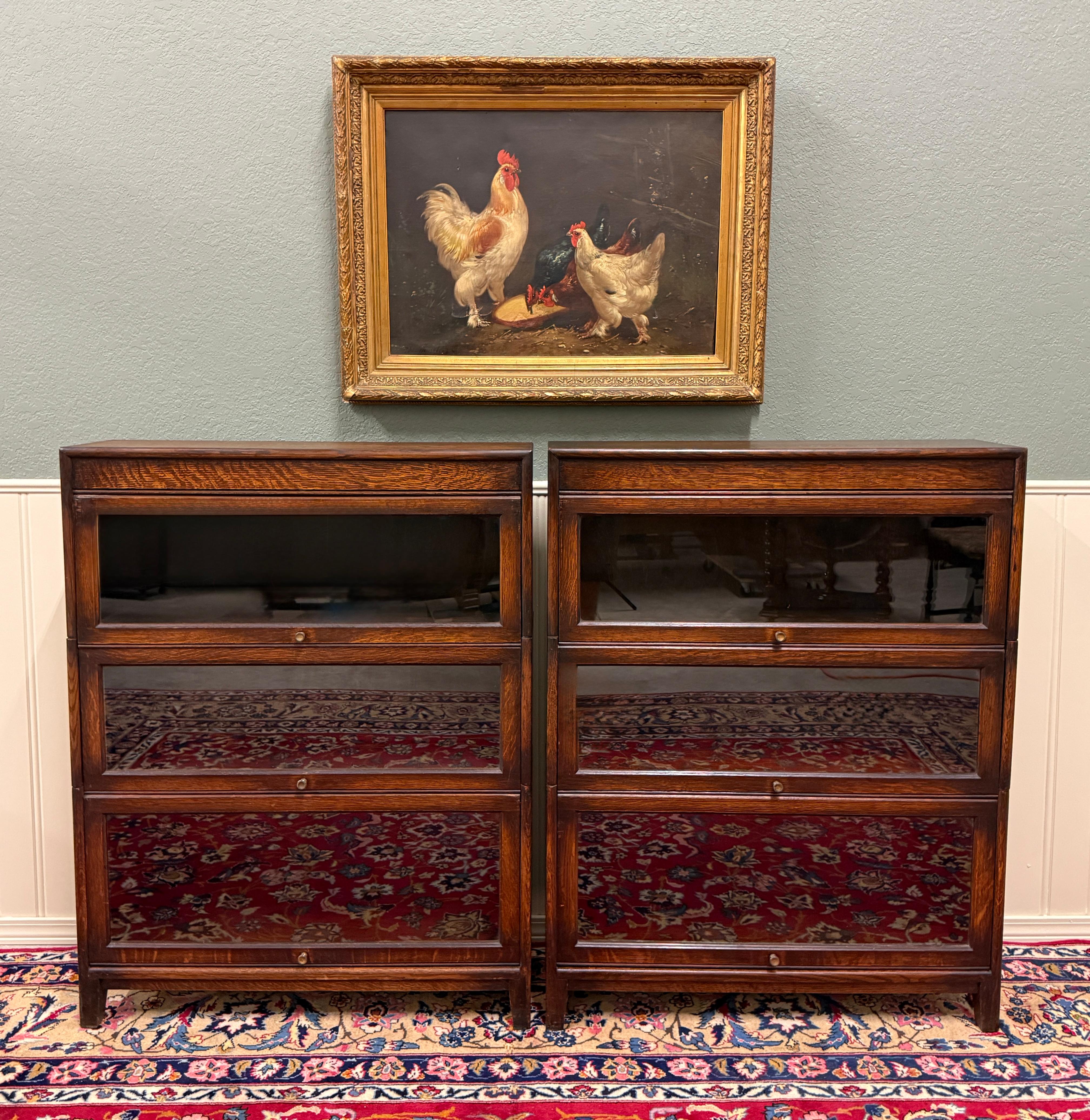 CHARMING Vintage PAIR of English Oak 3-Stack Barristers Lawyers Bookcase or Entry Hall Cabinets with 3 Glass Doors ~~c. Mid-Century

PERFECT for your favorite antique books or collectibles~~top surfaces are flat for additional display or flat screen