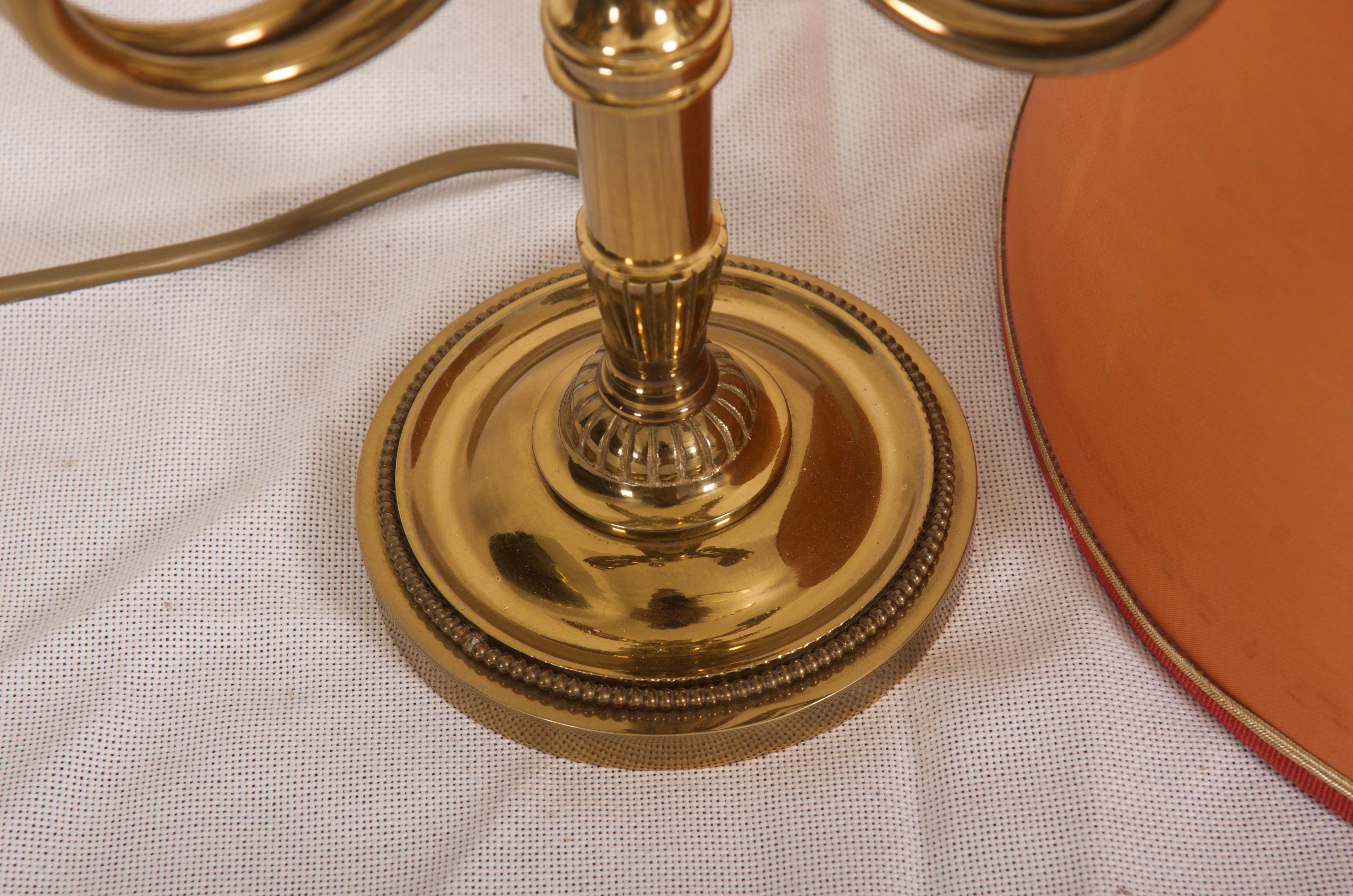 Brass base fitted with three E14 sockets Art Deco style made in England in the 1950s. 
Age and signs of use. Screens with minor damage or stains.
Vintage original condition.