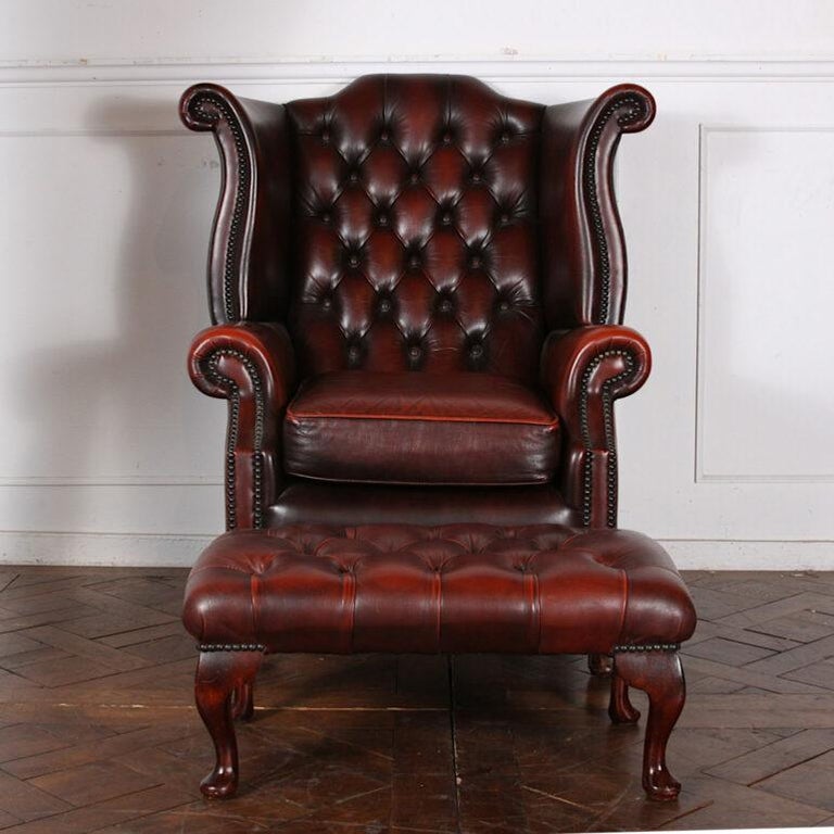 Mid-20th Century Vintage English Button Tufted Brown Leather Chair and Ottoman For Sale
