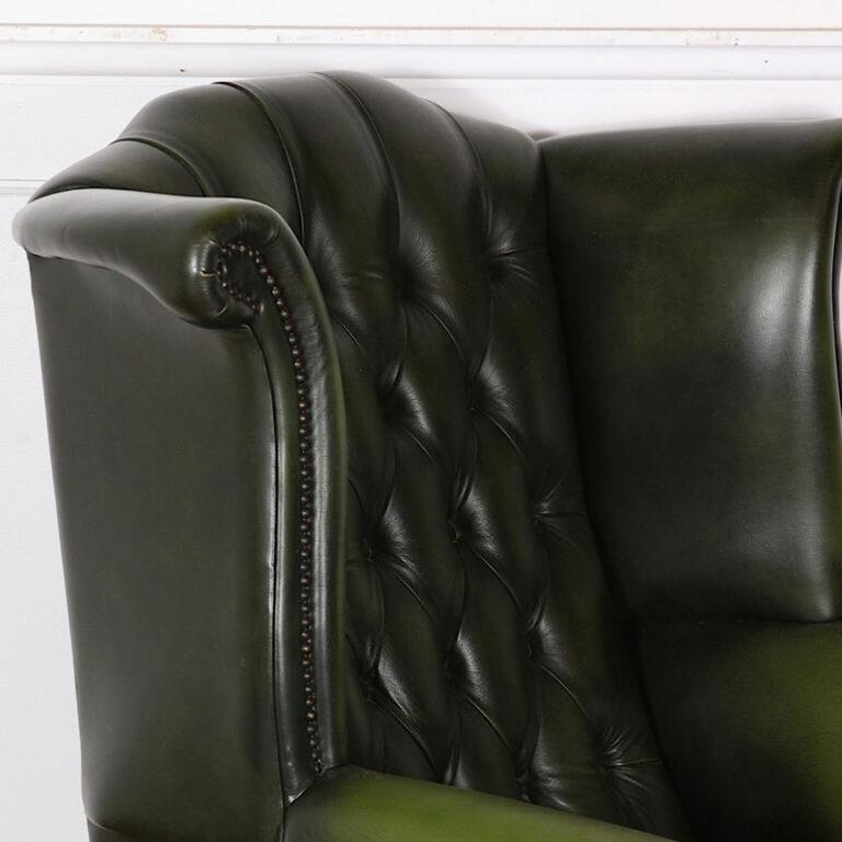 Vintage English Button Tufted Green Leather Wing Back Chair In Good Condition In Vancouver, British Columbia
