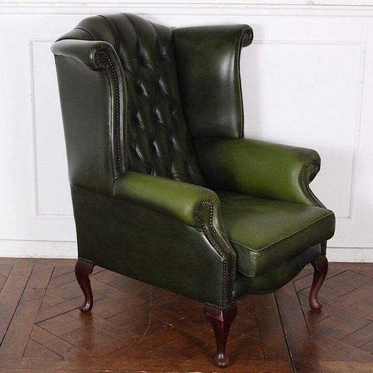 Mid-20th Century Vintage English Button Tufted Green Leather Wing Back Chair
