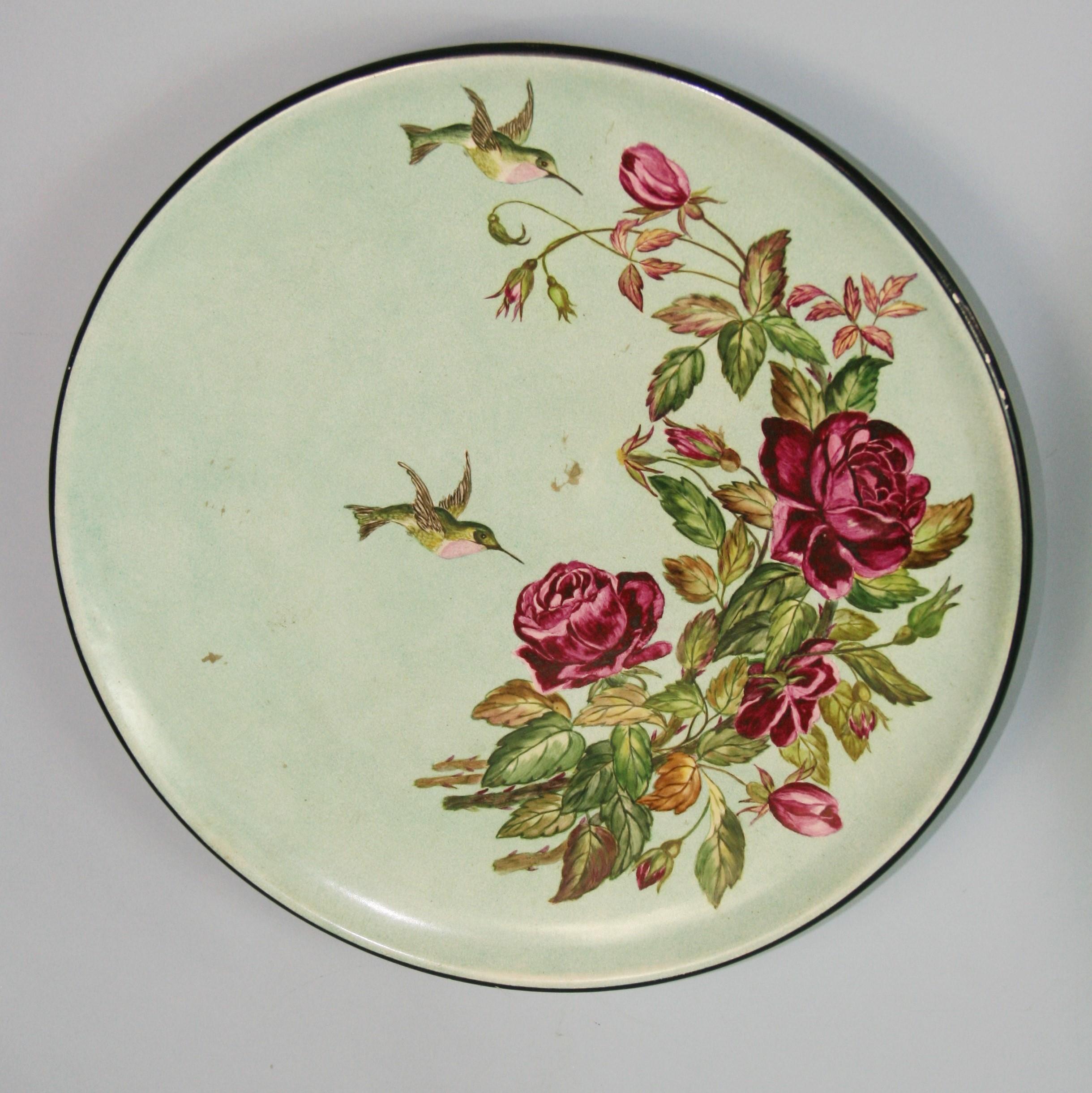 1581 English ceramic charger hand painted with humming birds and roses
Hanging wire on back