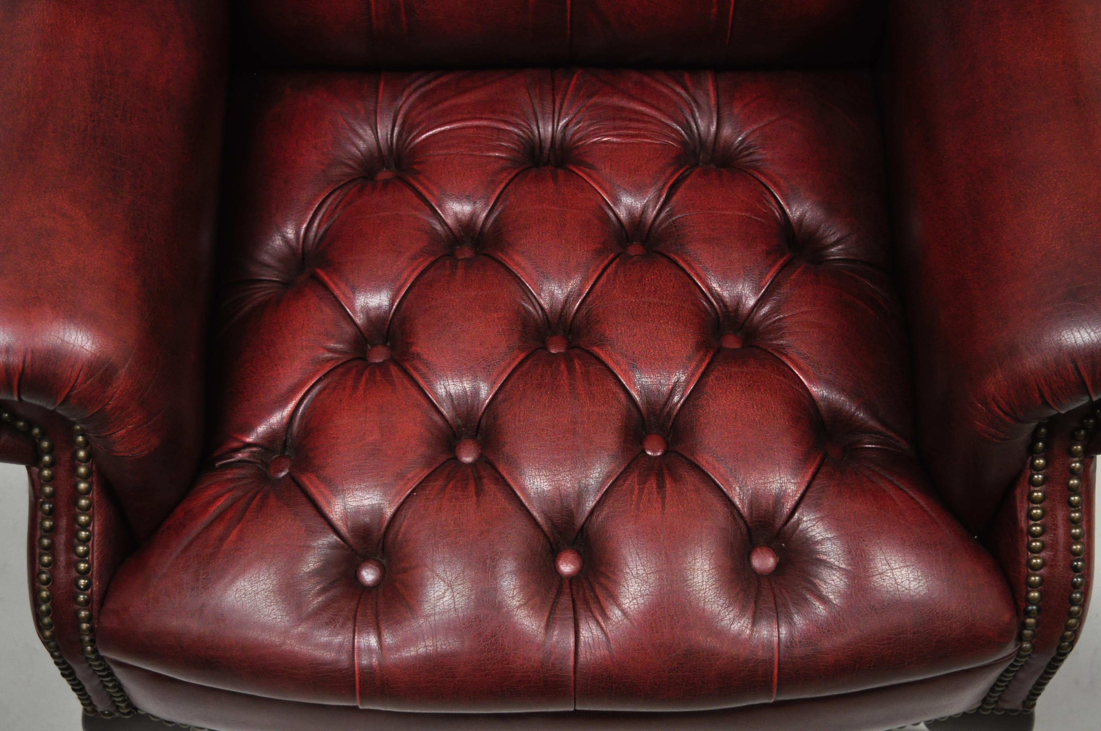 European Vintage English Chesterfield Burgundy Leather Tufted Wingback Chair and Ottoman
