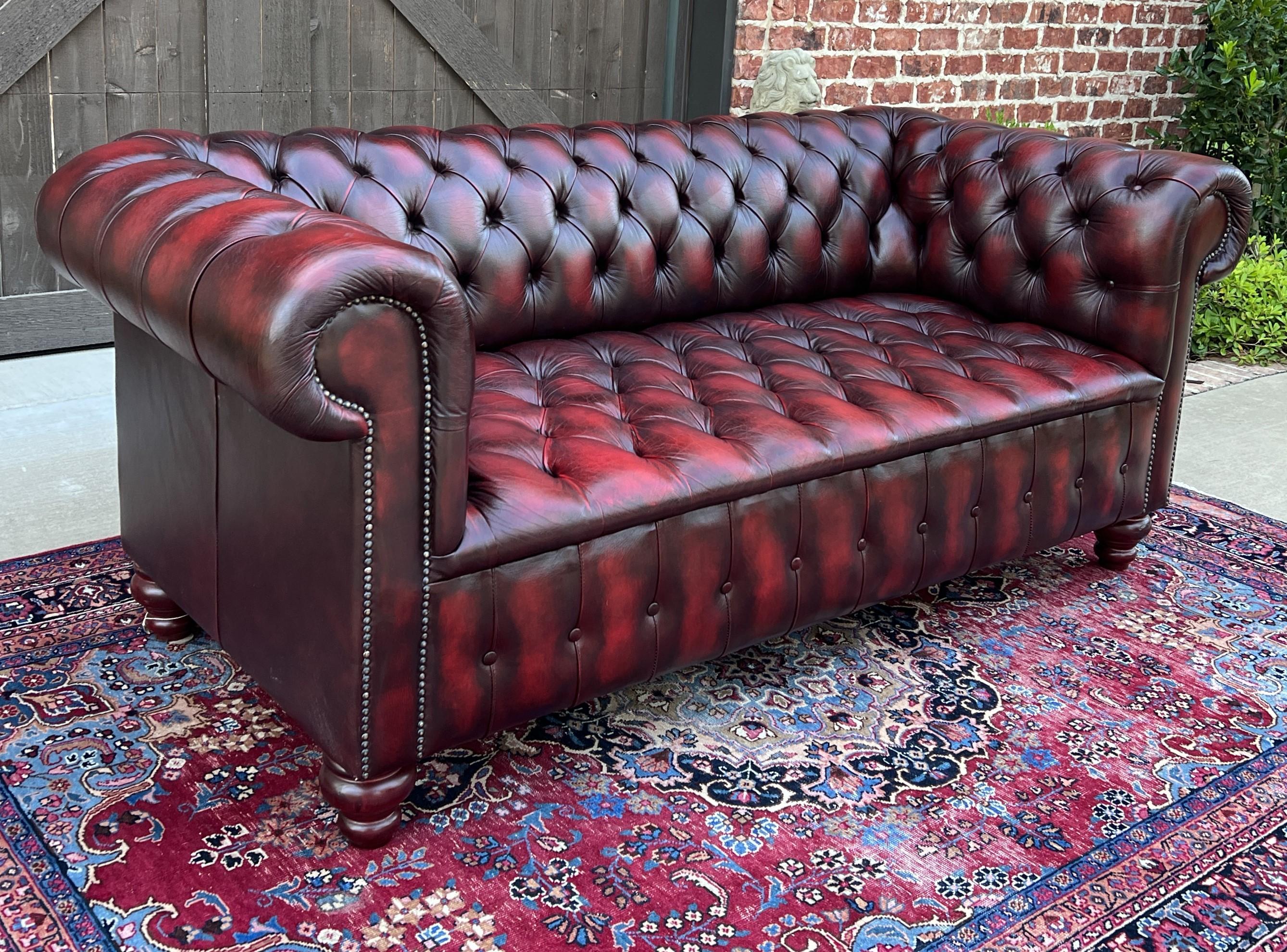 TIMELESS Vintage Mid-Century English Leather Tufted Seat CHESTERFIELD 3-Seat Sofa in Oxblood Red

PERFECT ICONIC look for a gentleman's office, study, library, or cigar lounge~~fully tufted button seat and rolled arms with low back~~oxblood red
