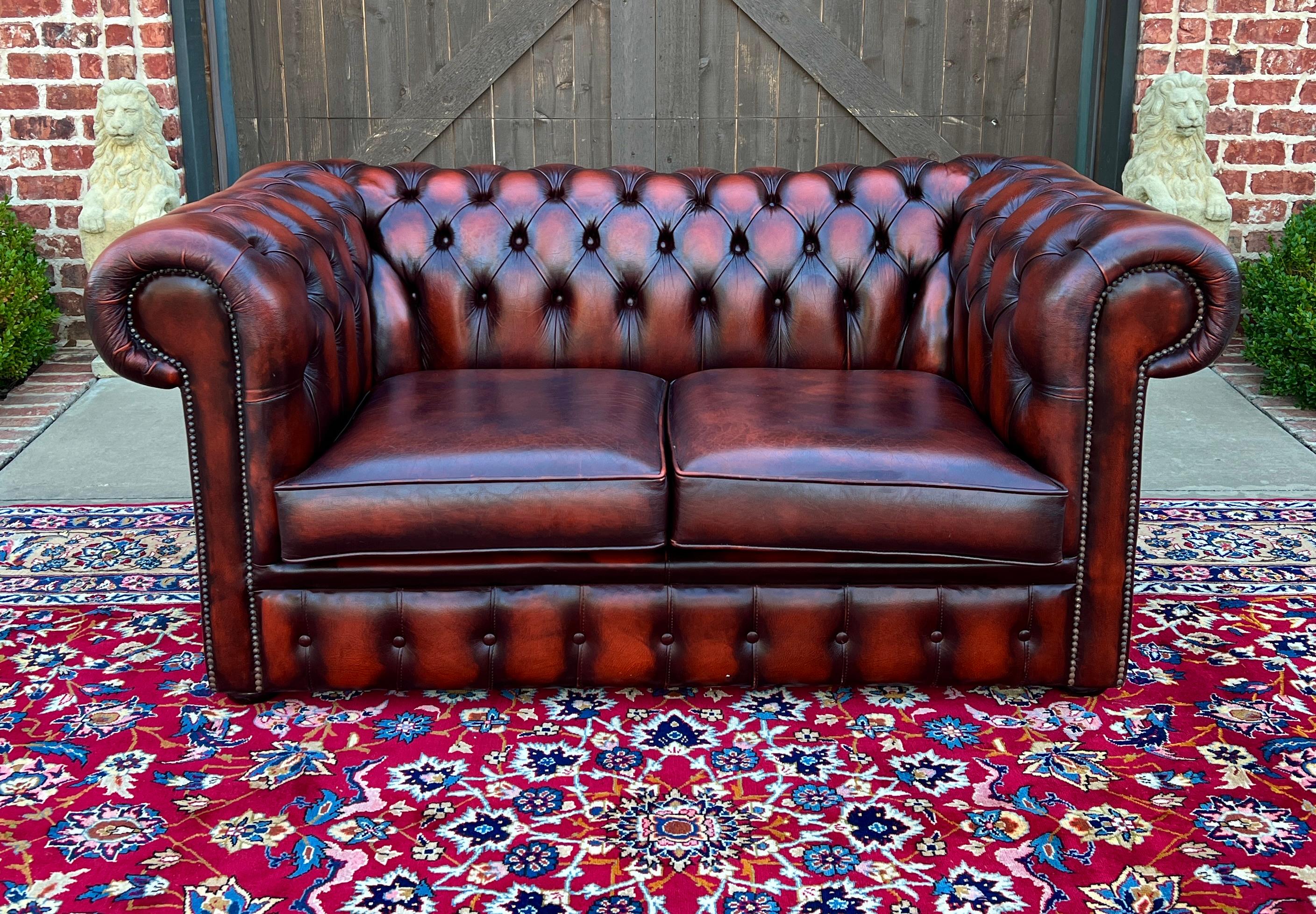 TIMELESS Vintage English Leather Tufted Seat CHESTERFIELD 2-Seat Sofa/Love Seat Oxblood Red

PERFECT ICONIC look for a gentleman's office, study, library, or cigar lounge~~fully button tufted upholstery is oxblood red in color~~timeless traditional