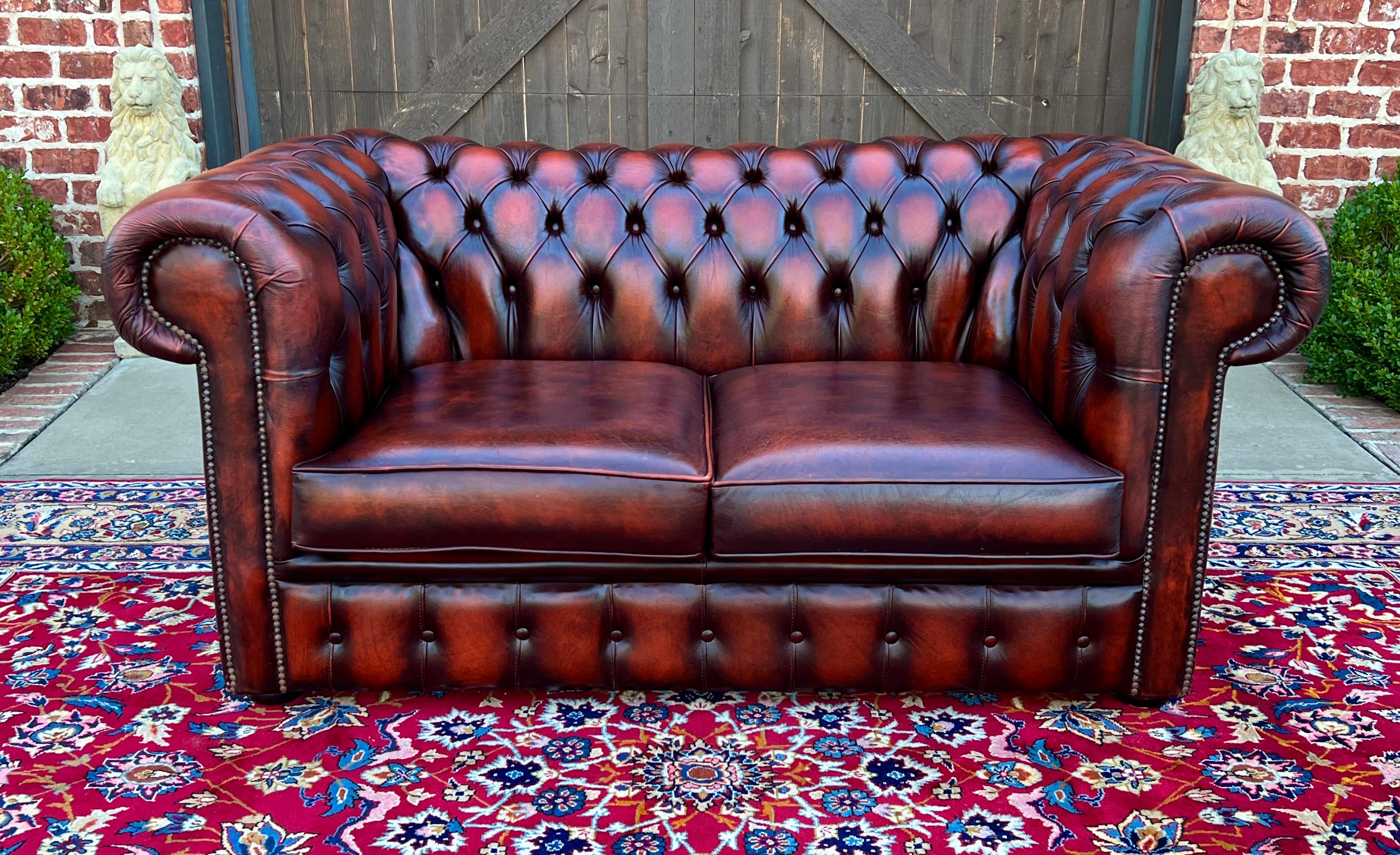 TIMELESS Vintage English Leather Tufted Seat CHESTERFIELD 2-Seat Sofa/Love Seat Oxblood Red

PERFECT ICONIC look for a gentleman's office, study, library, or cigar lounge~~fully button tufted upholstery is oxblood red in color~~timeless traditional