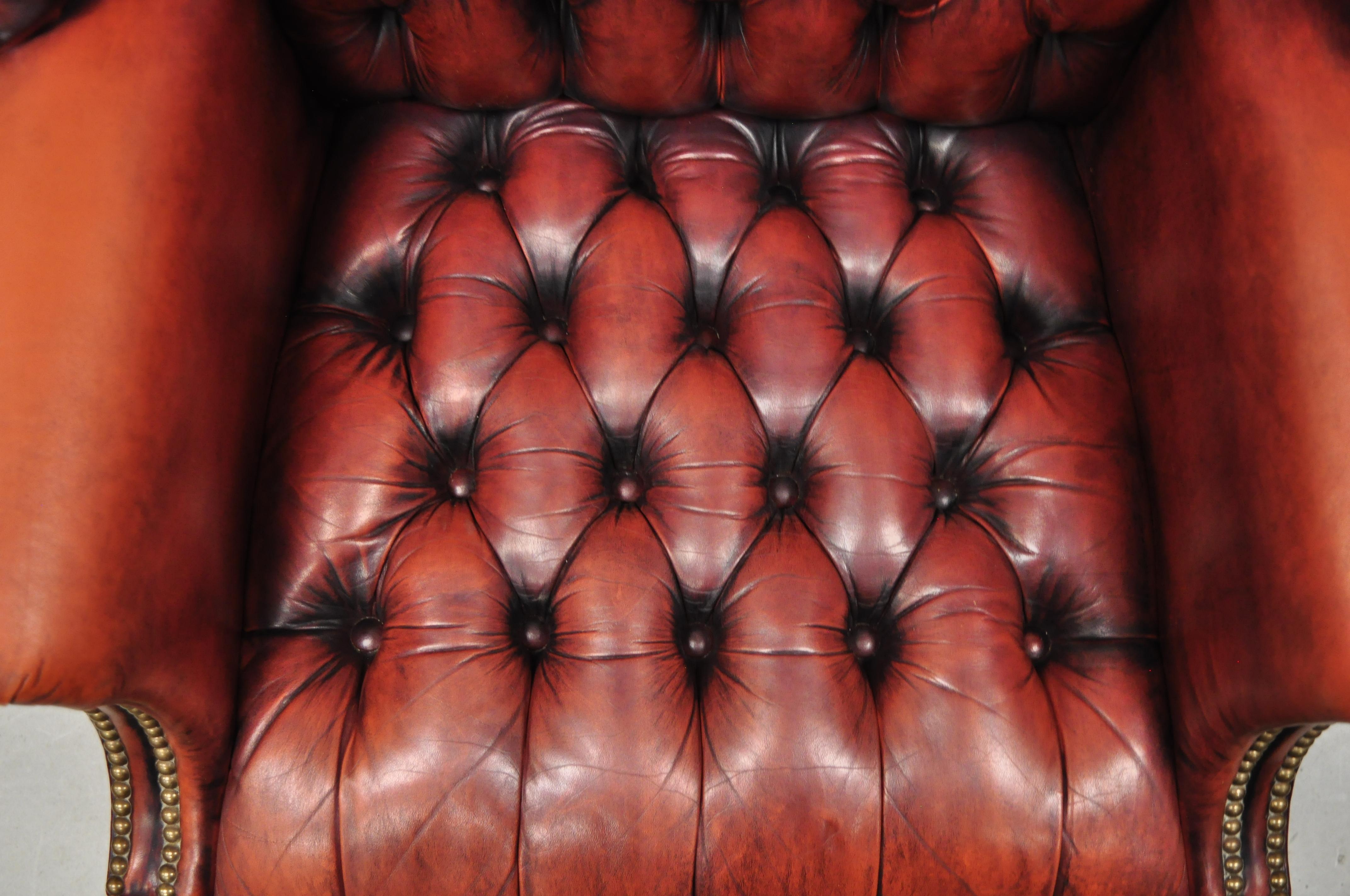 Vintage English Chesterfield Style Button Tufted Burgundy Leather Wingback Chair In Good Condition In Philadelphia, PA
