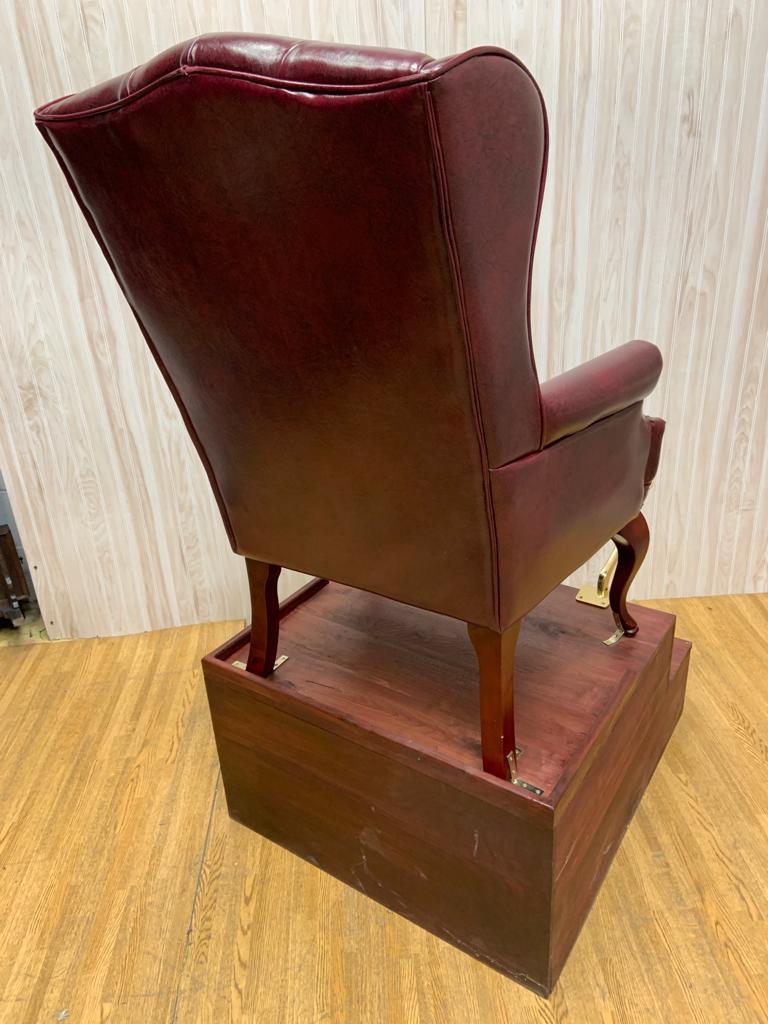 Hand-Crafted Vintage English Chesterfield Style Tufted Leather Chair on a Shoe Shine Stand