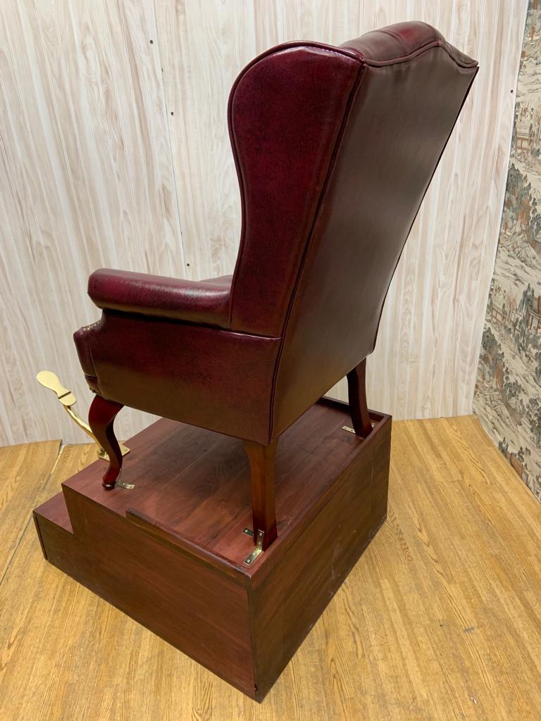 Vintage English Chesterfield Style Tufted Leather Chair on a Shoe Shine Stand In Good Condition In Chicago, IL