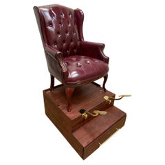 Vintage English Chesterfield Style Tufted Leather Chair on a Shoe Shine Stand