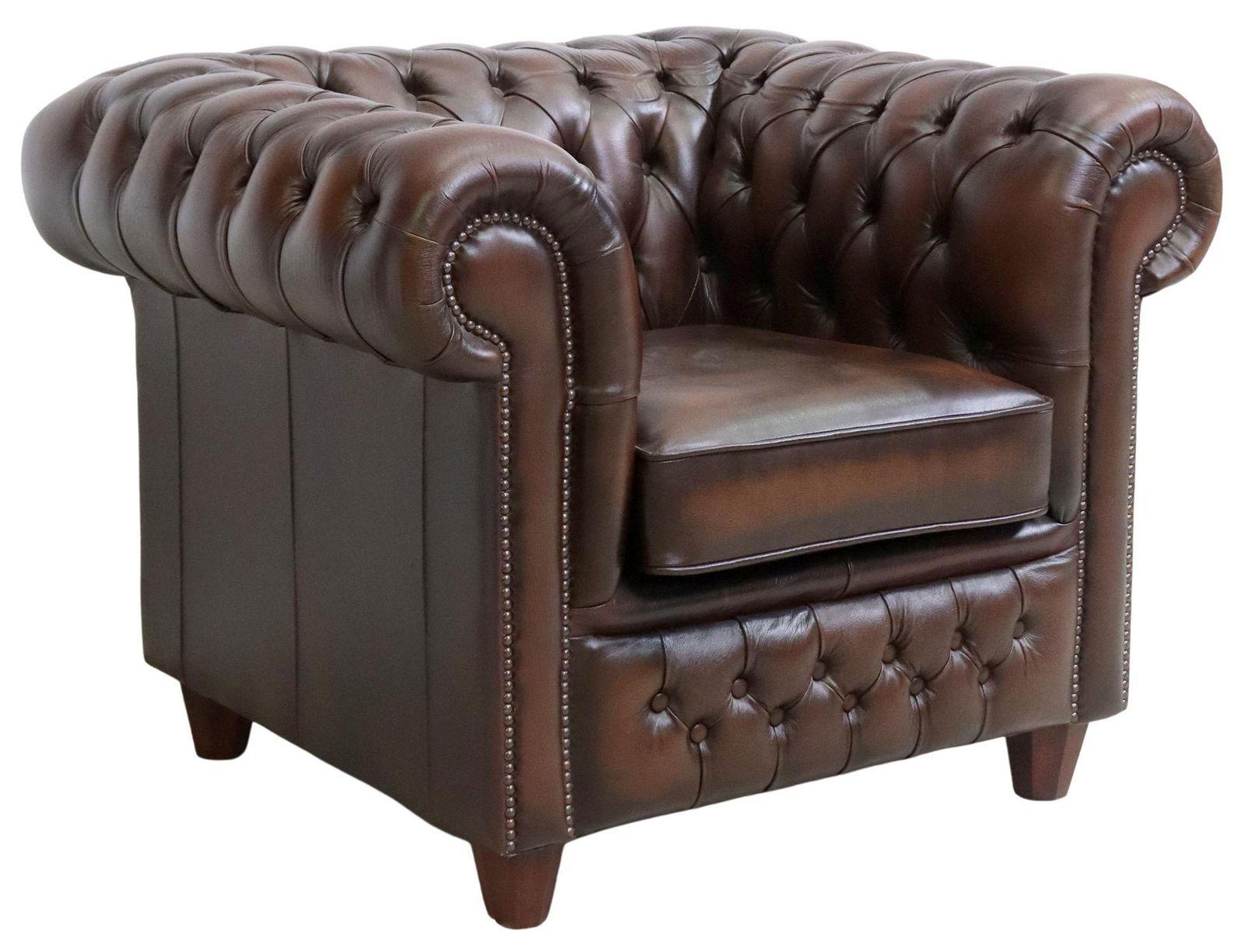 Vintage English Chesterfield club chair, Chesterfield Manufacturing UK, late 20th c.. Club chair in brown button-tufted leather upholstery, rising on tapered legs.

Dimensions
approx 30.5
