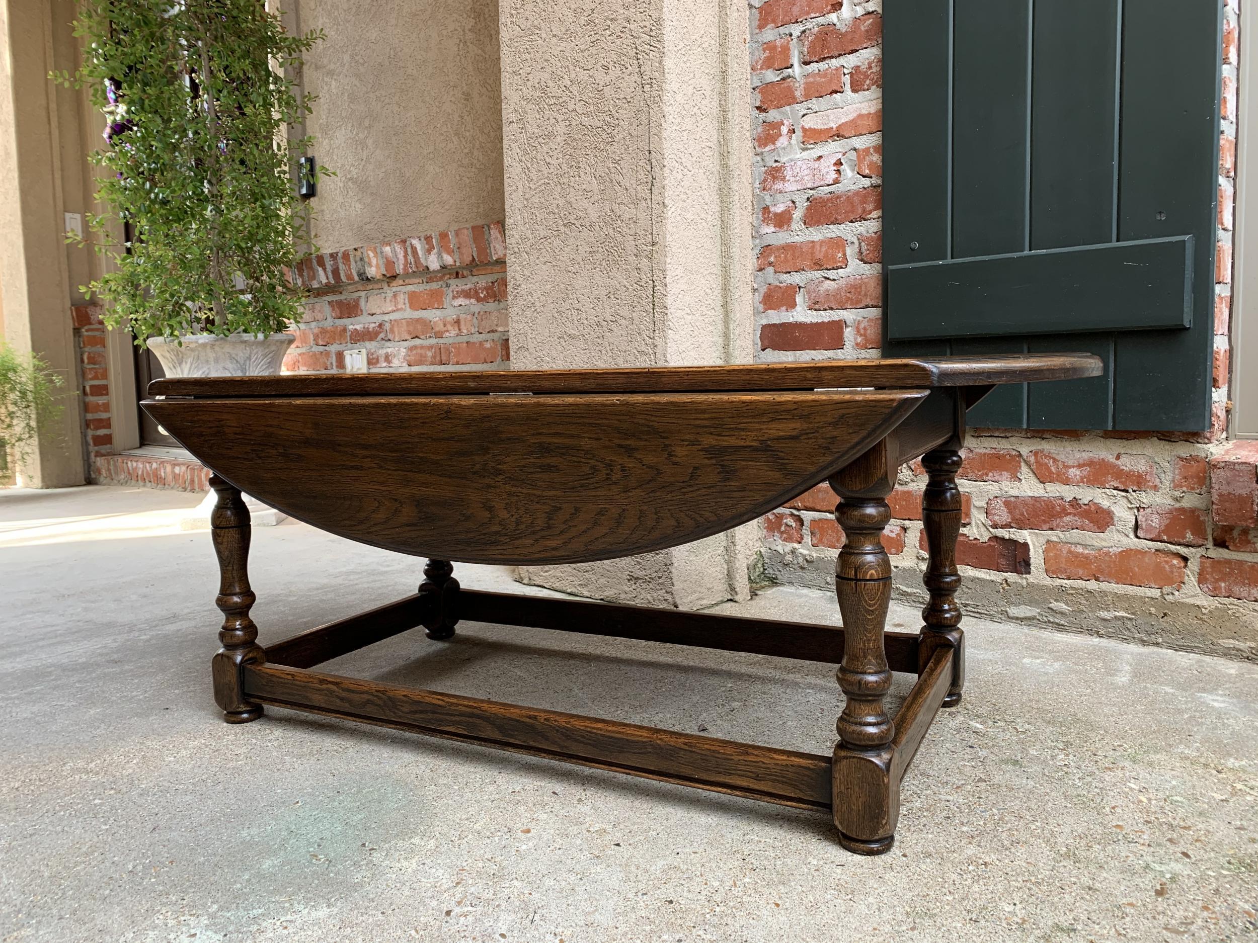 Mid-20th Century Vintage English Coffee Table Slender Drop-Leaf Jacobean Wake Table Style Oval