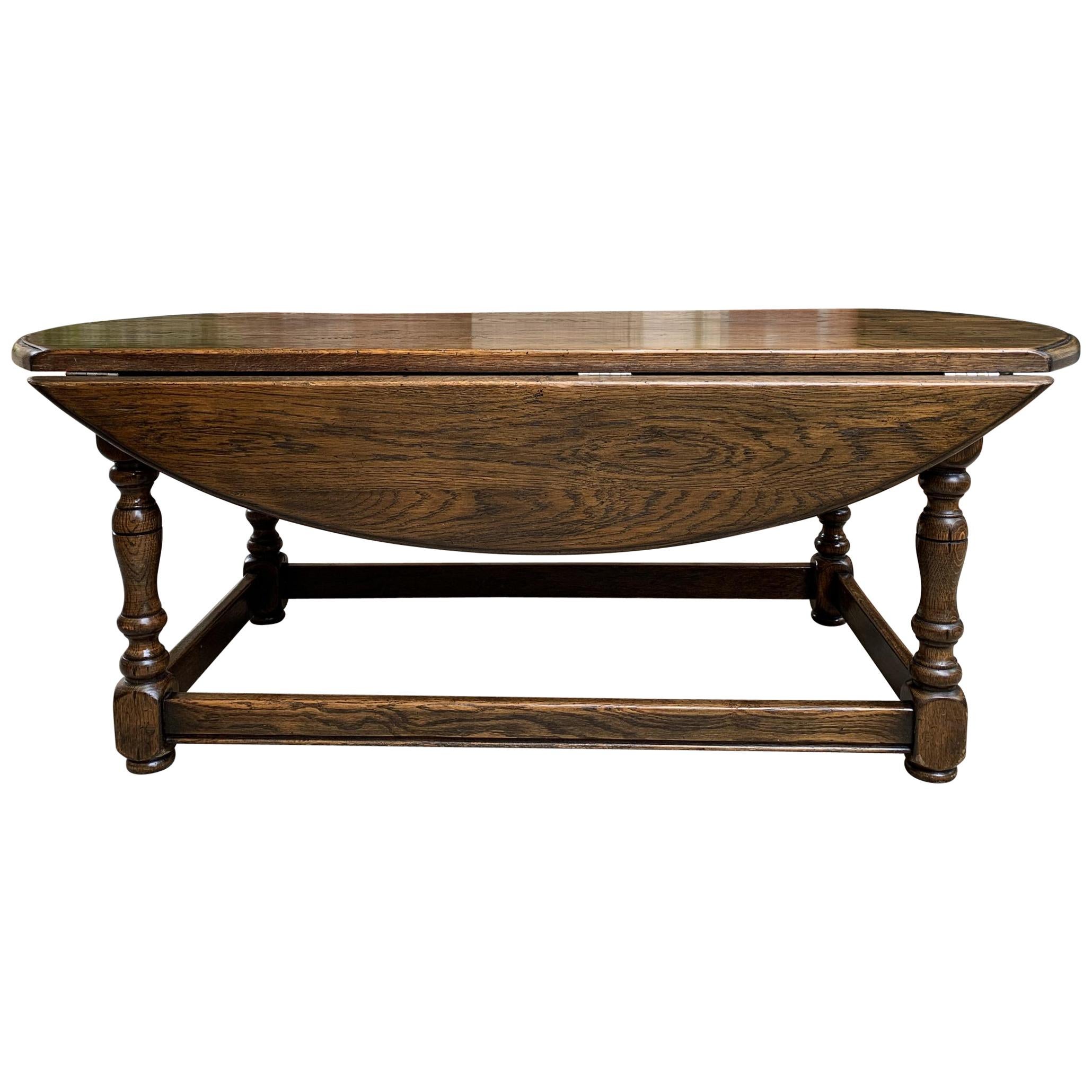 Vintage English Coffee Table Slender Drop-Leaf Jacobean Wake Table Style Oval