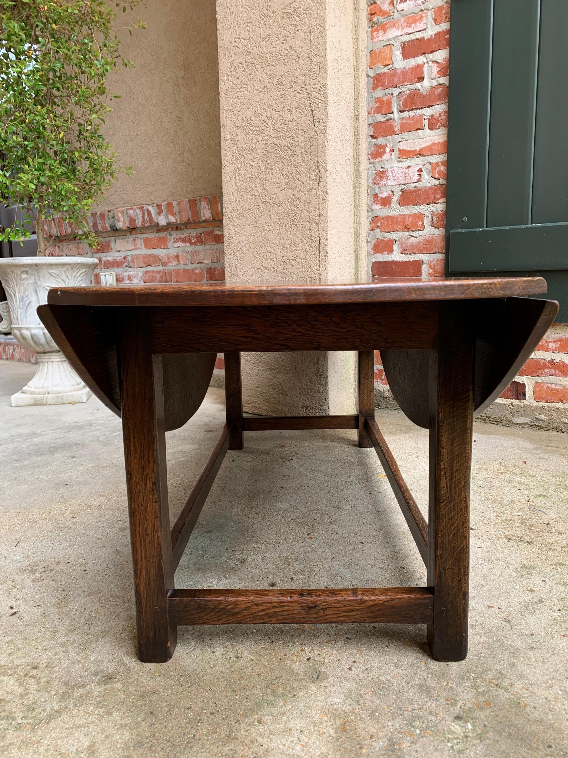 Vintage English Coffee Table Slender Drop Leaf Wake Table Oval Mid Century 2
