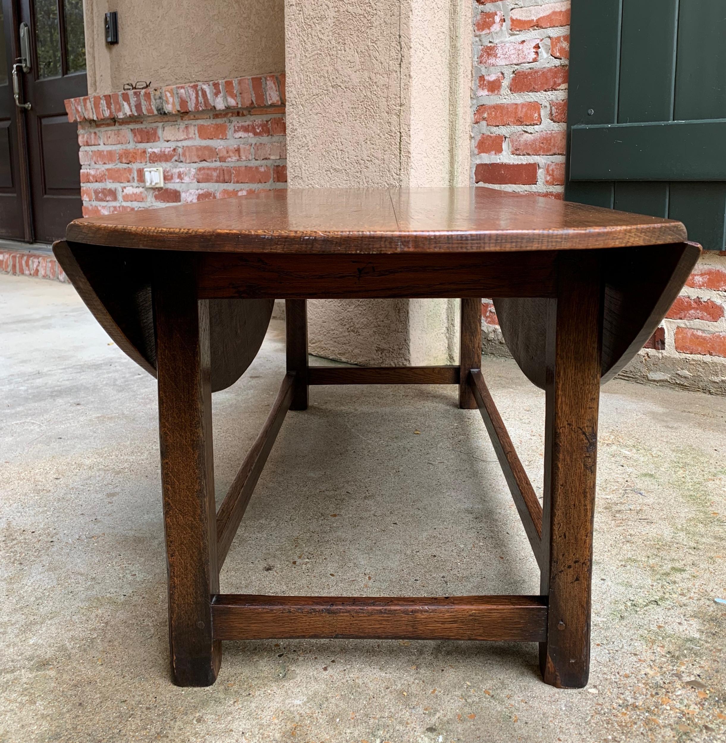Vintage English Coffee Table Slender Drop Leaf Wake Table Oval Mid Century 3