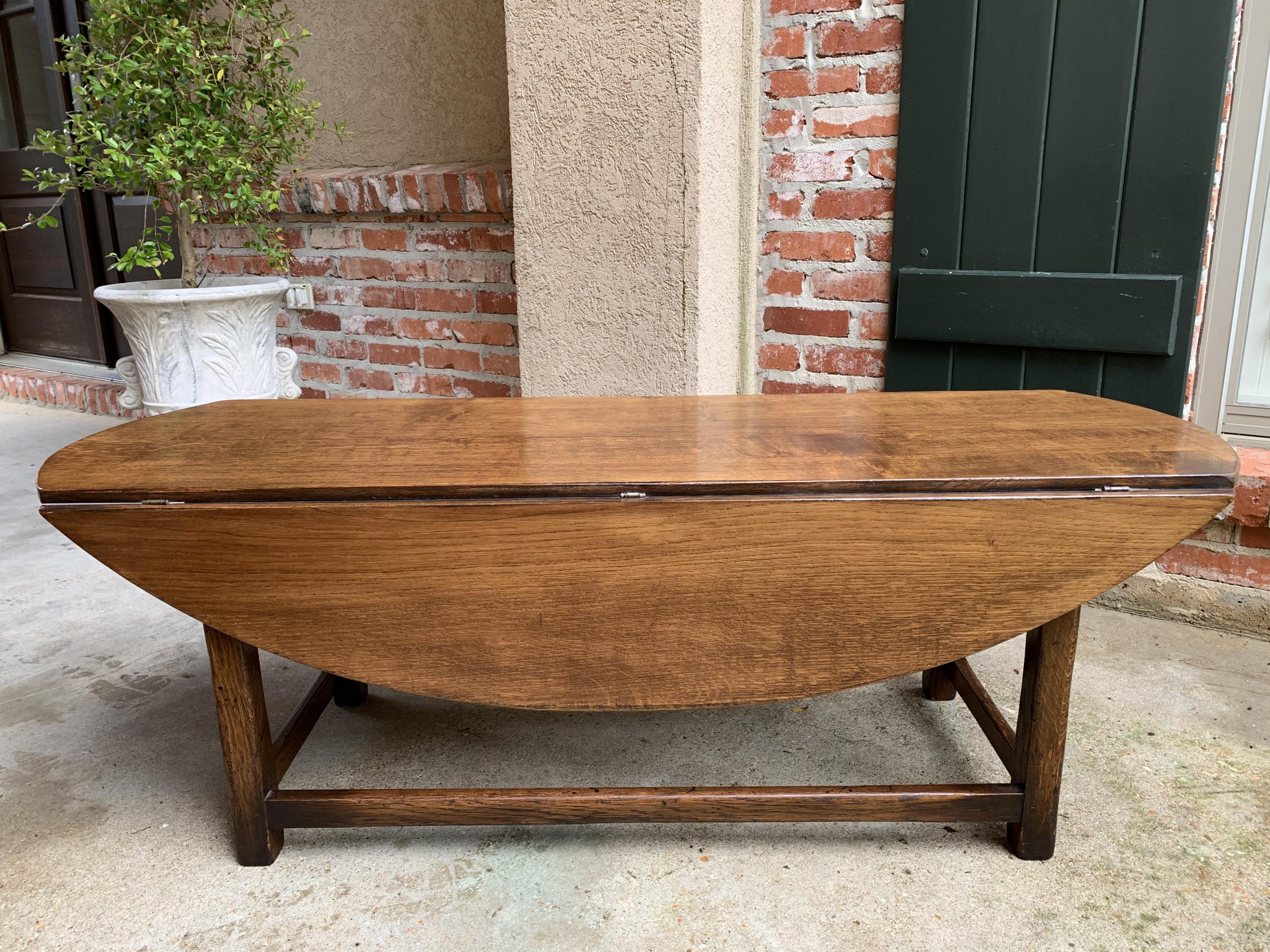 Vintage English Coffee Table Slender Drop Leaf Wake Table Oval Mid Century 8