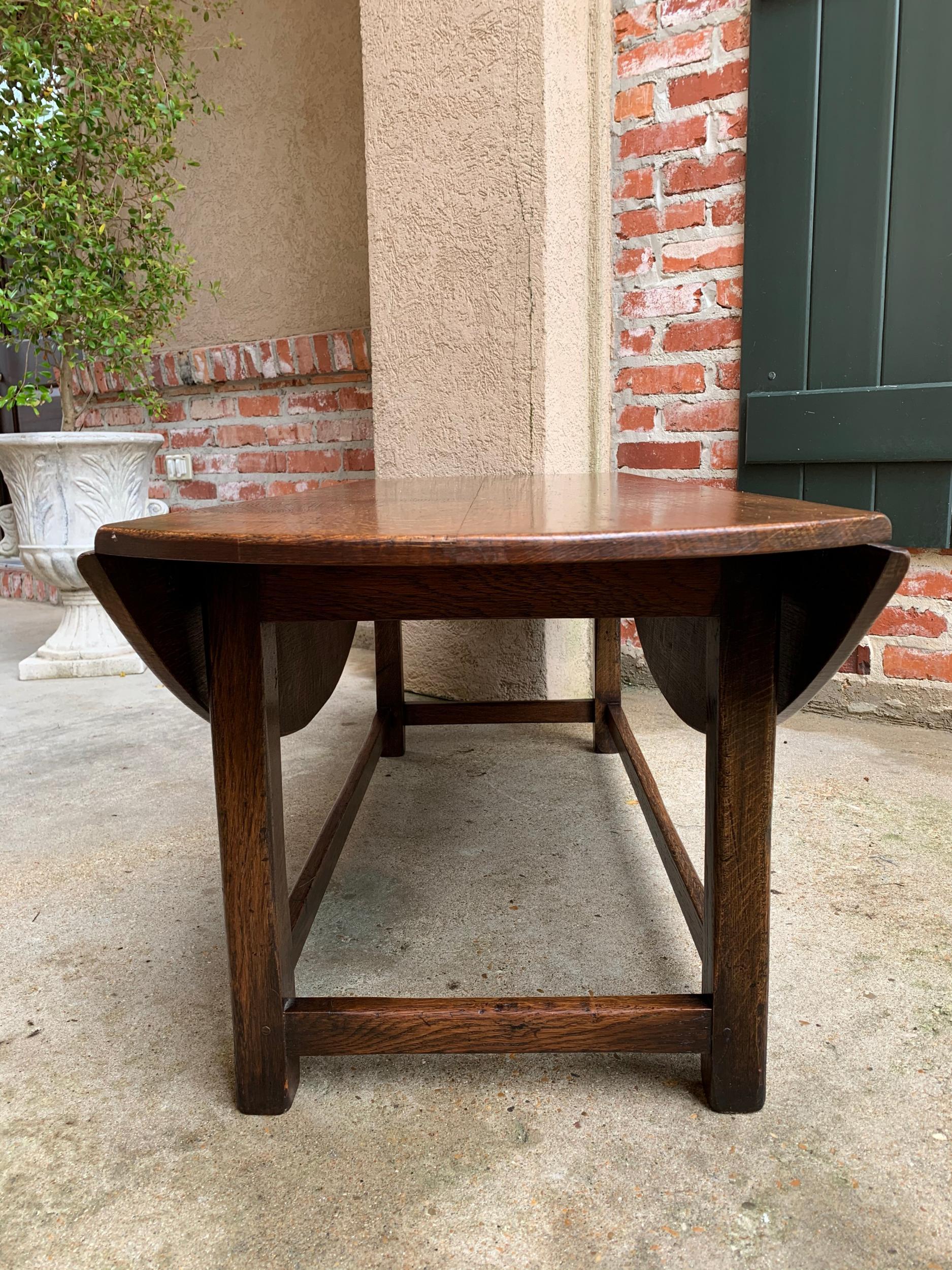 Vintage English Coffee Table Slender Drop Leaf Wake Table Oval Mid Century 9