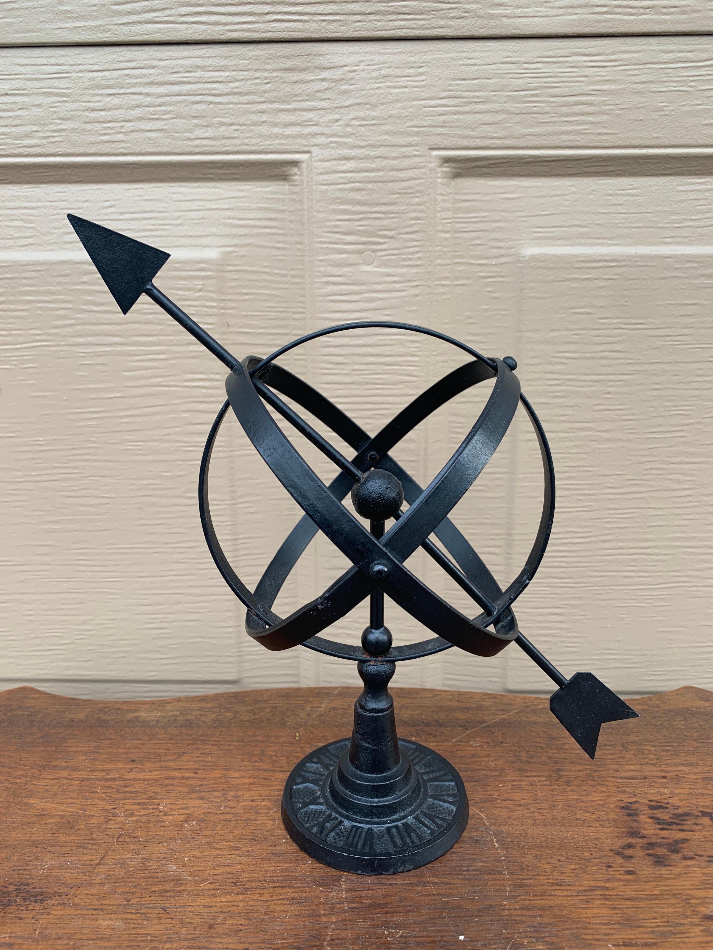 A stunning vintage English country or Neoclassical style black iron garden armillary sundial with Roman numerals

USA, Late 20th Century

Measures: 9.5