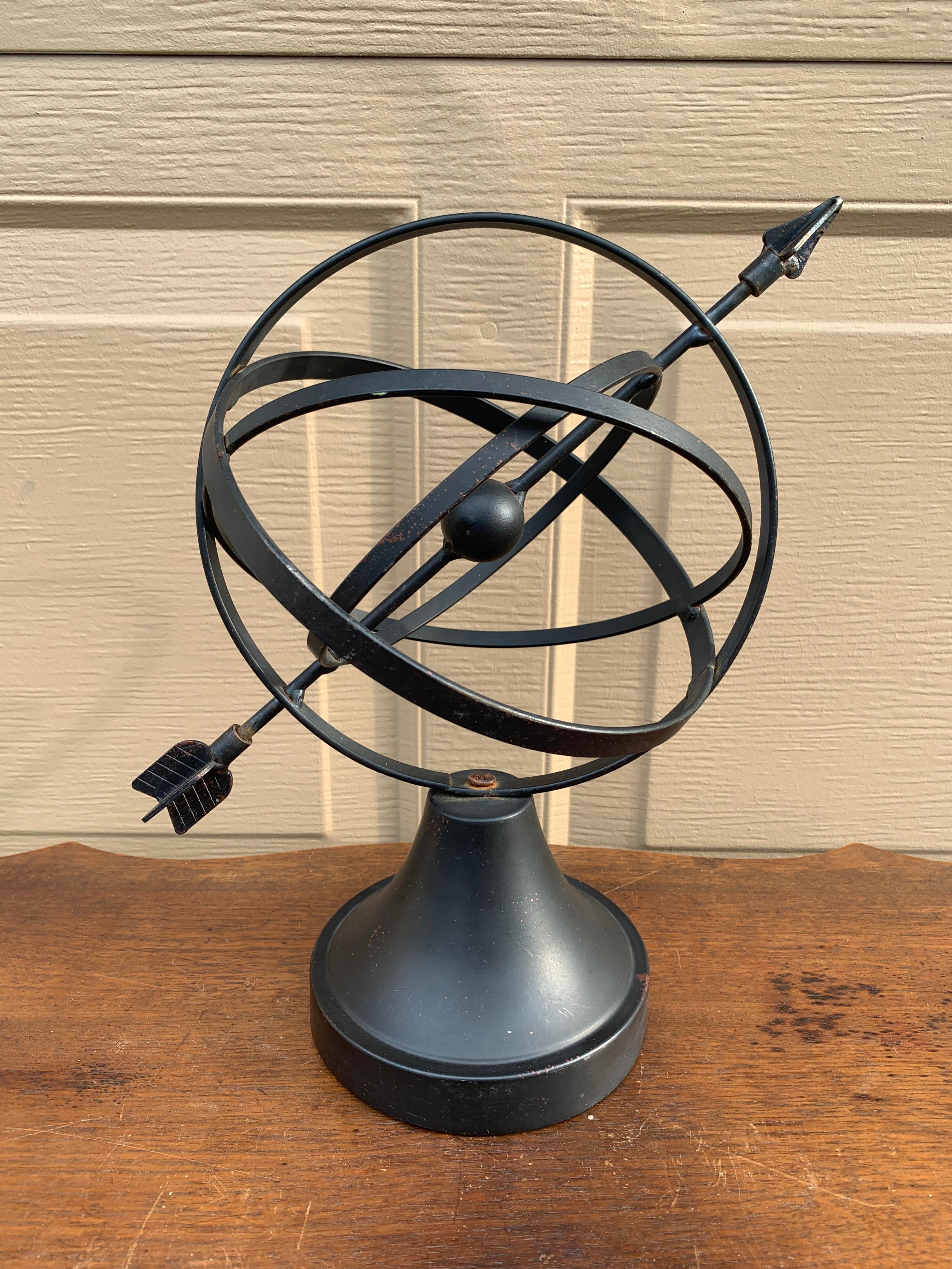 A stunning vintage English country or Neoclassical style black iron garden armillary sundial sphere

USA, Late 20th Century

Measures: 11