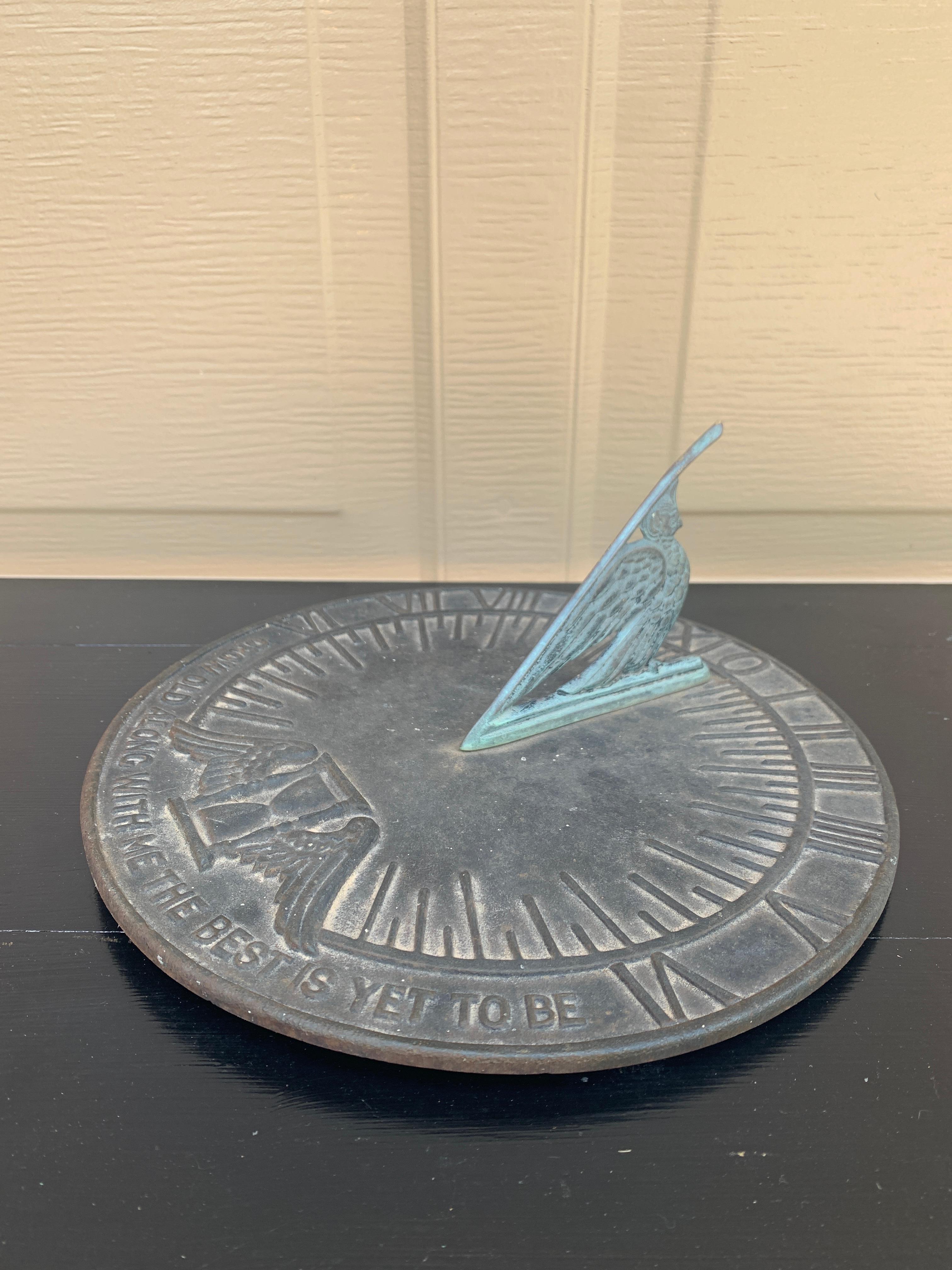 A stunning vintage iron verdigris garden sundial reading 