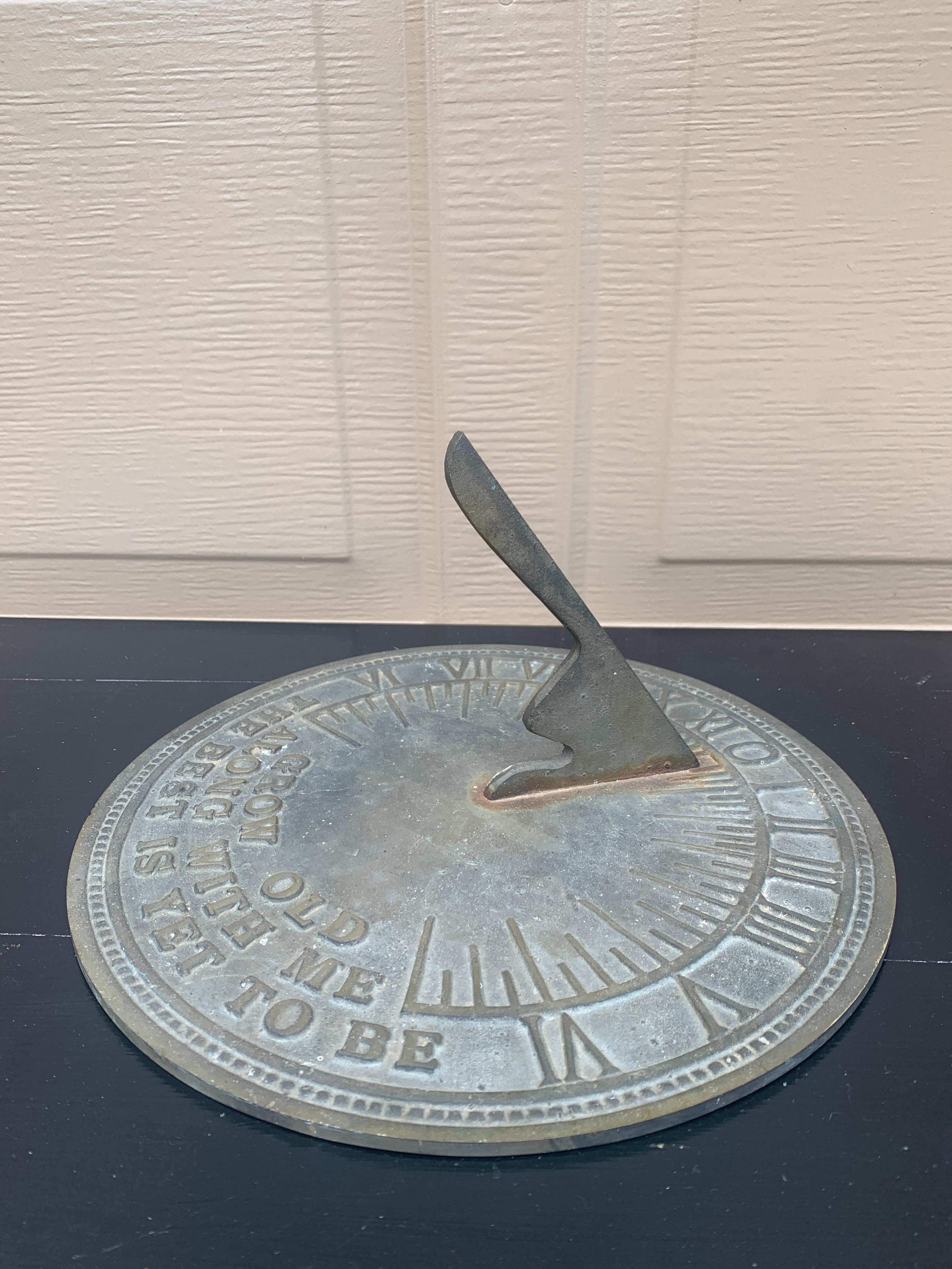 A stunning vintage iron verdigris garden sundial reading 
