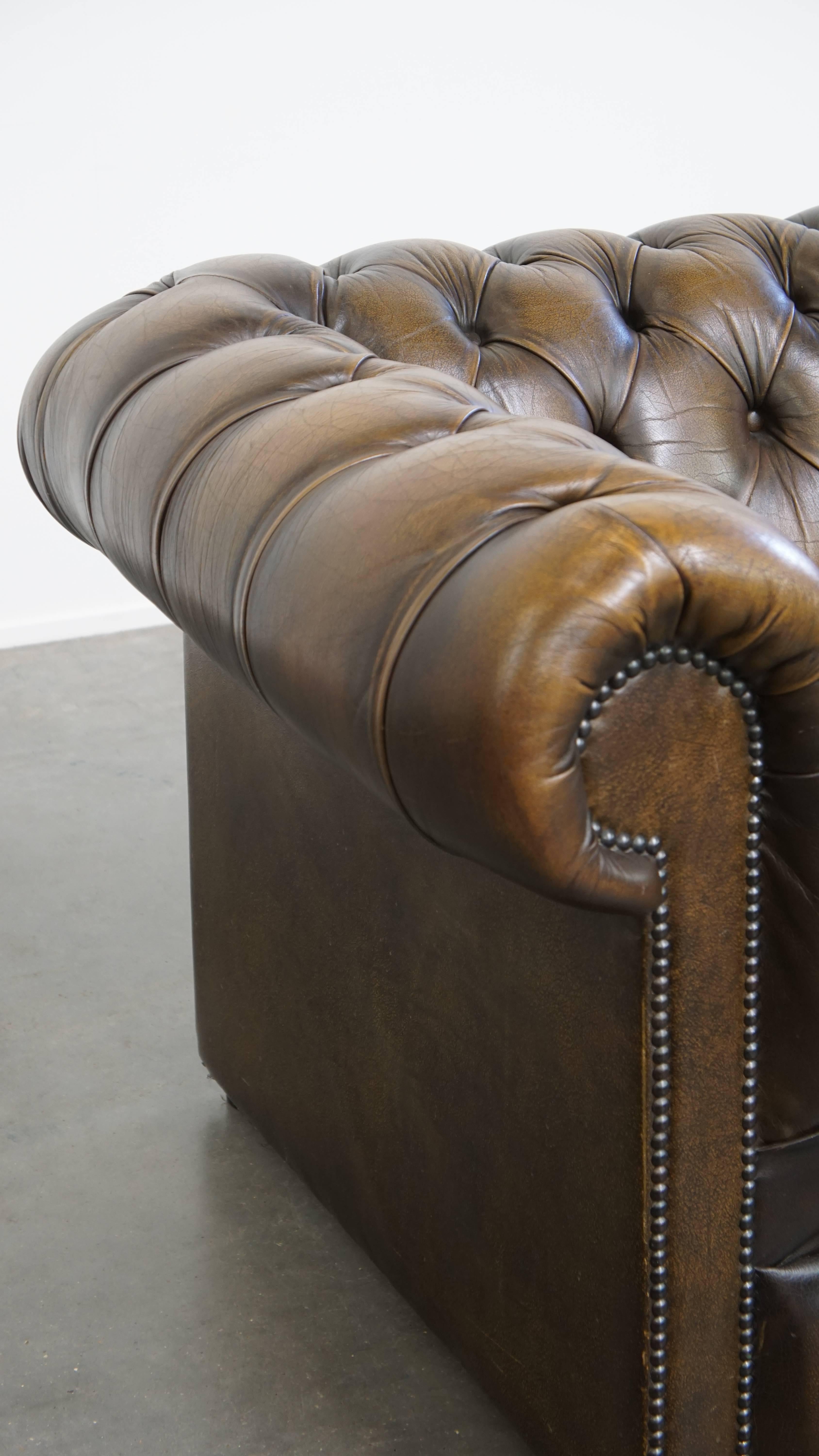 Vintage English Cowhide Leather Chesterfield Button Seat Armchair For Sale 5