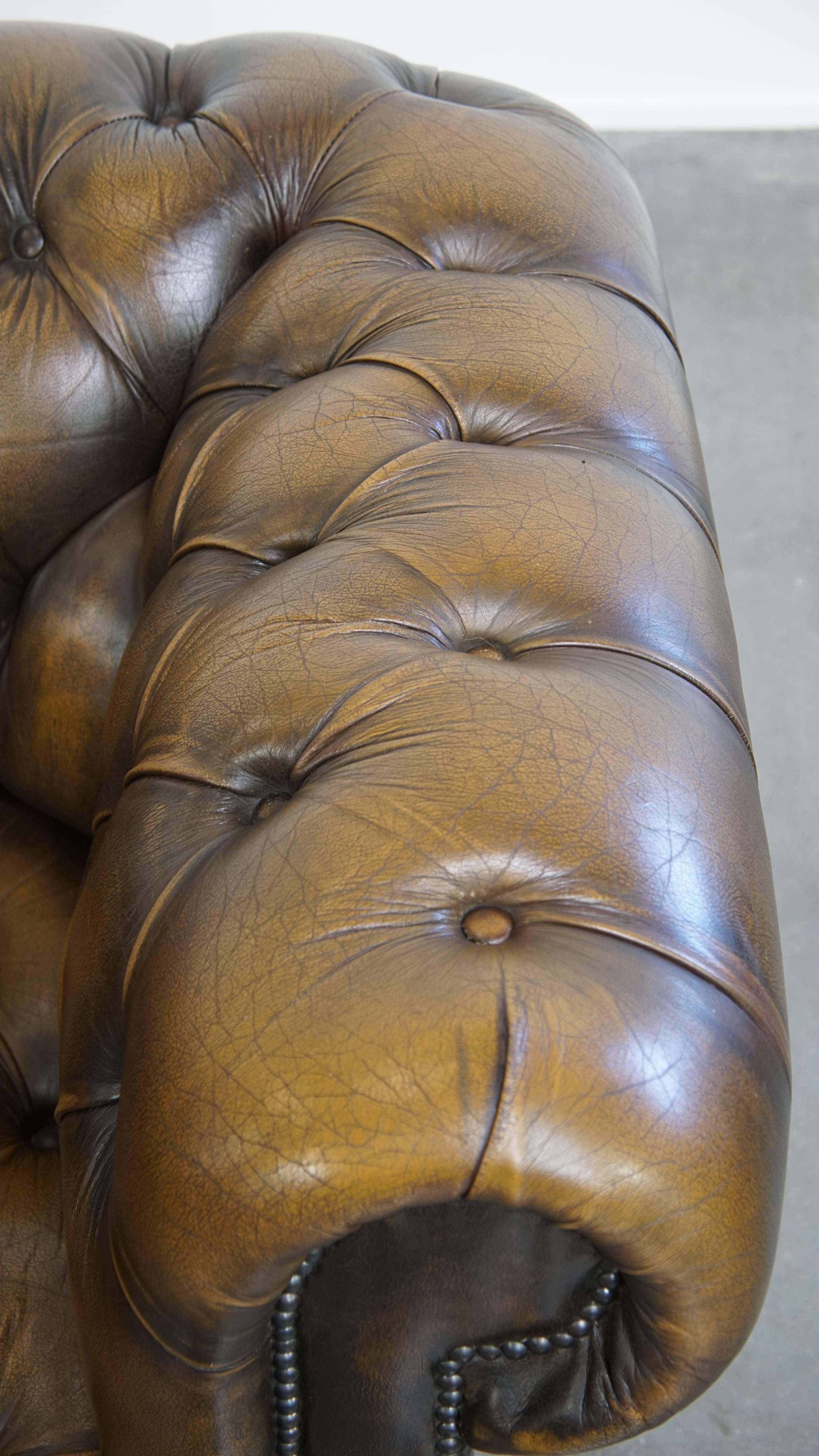 Vintage English Cowhide Leather Chesterfield Button Seat Armchair For Sale 3