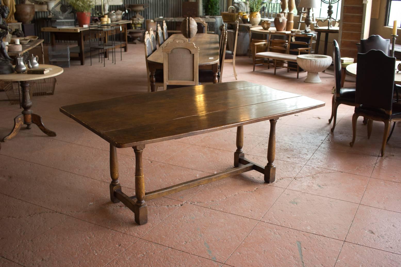 Vintage solid oak drop-leaf table with centre stretcher.