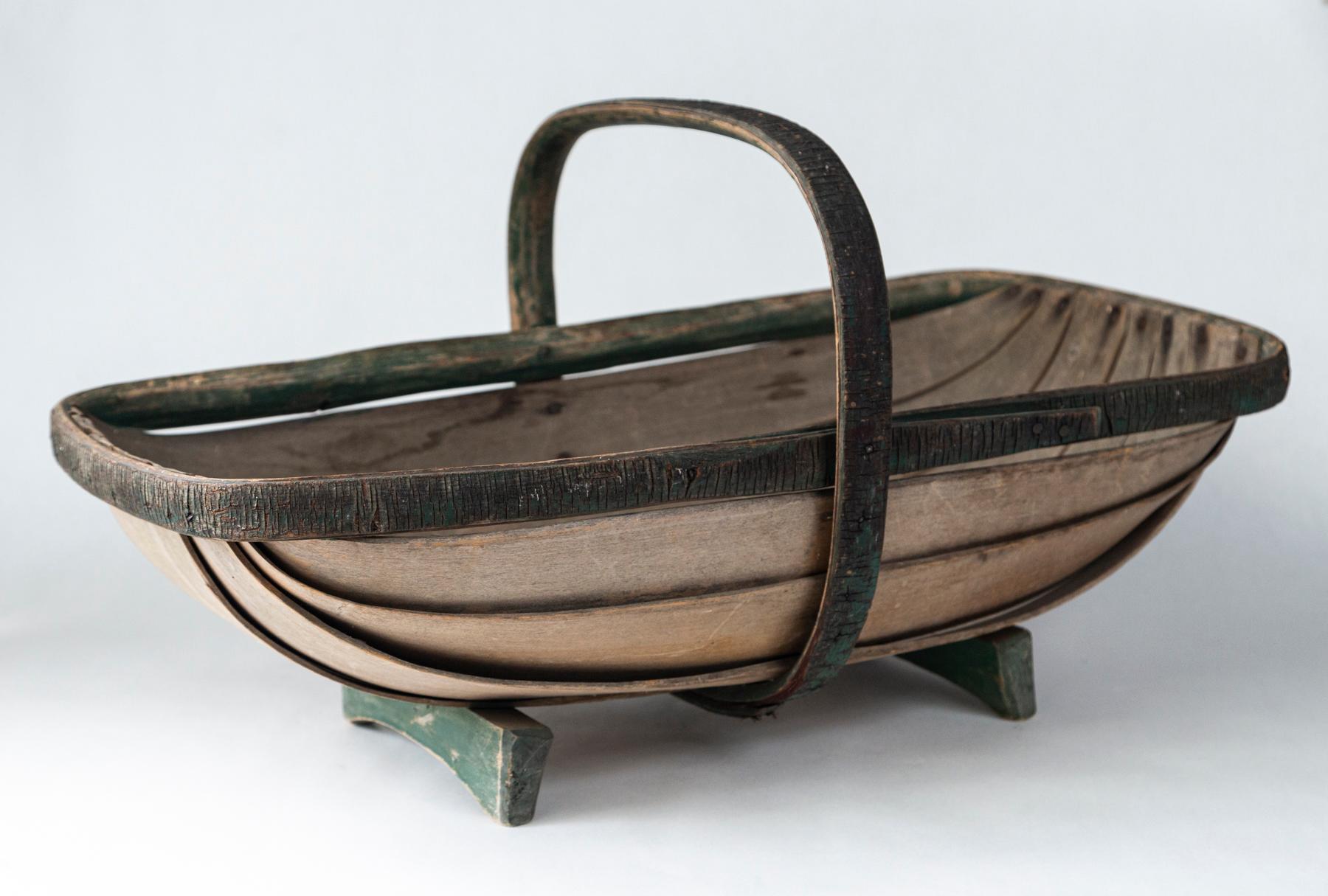 Vintage English garden trug (basket), circa 1930. Traditional Sussex oblong shape, bentwood construction. Trugs were designed to gather flowers and herbs from the garden. Lovely aged wood surface with original paint.