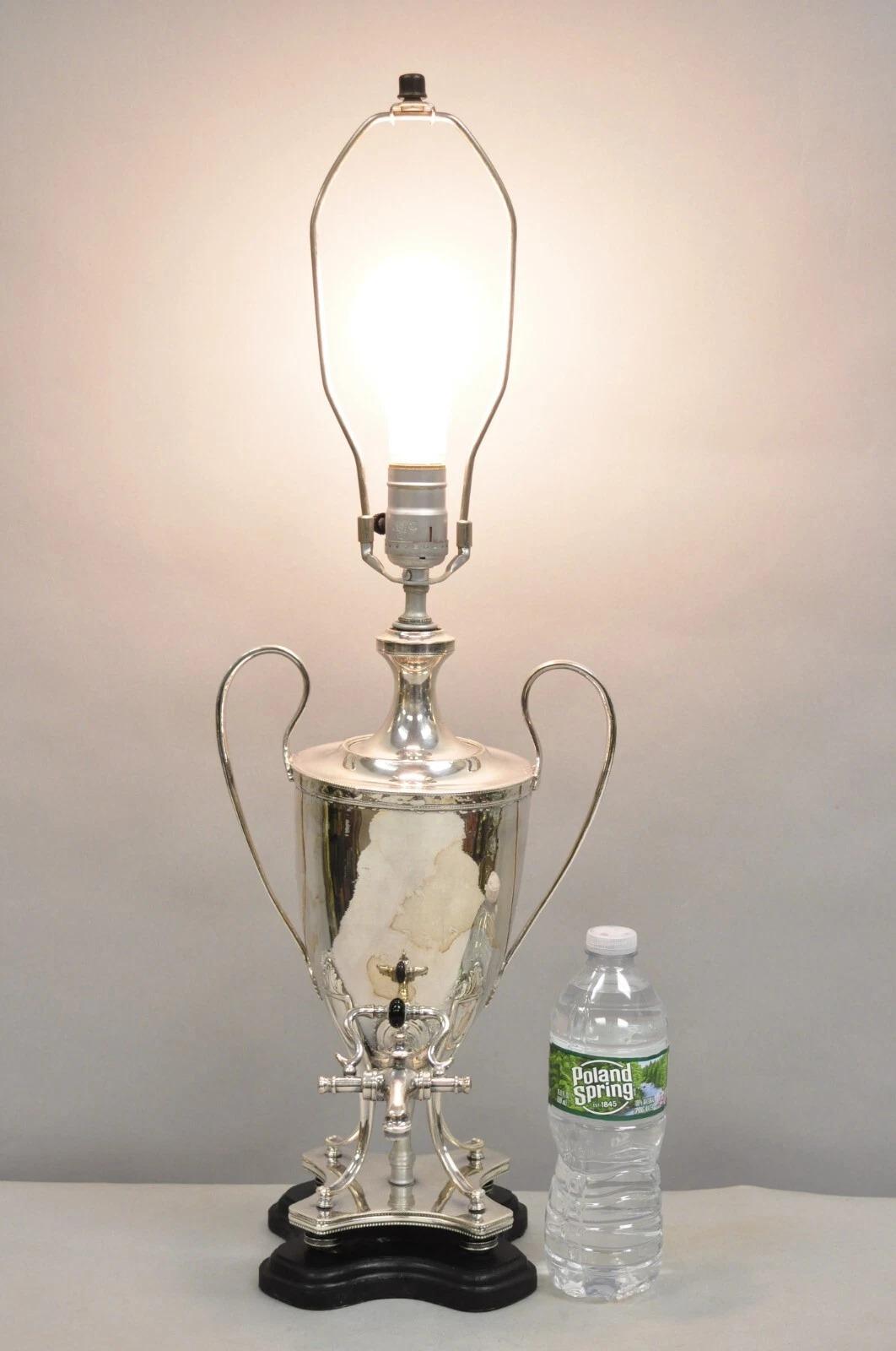 Vintage English Georgian Style Silver Plated Urn Trophy Cup Samovar Converted Table Lamp Raised on Wooden Base. Circa Mid 20th Century. Measurements: 26