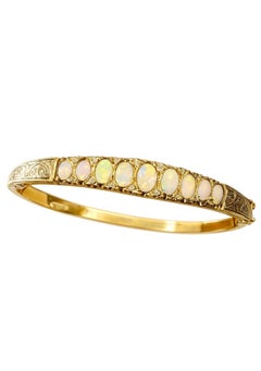 Brazalete articulado de estilo neovictoriano inglés antiguo, con ópalo dorado y diamantes