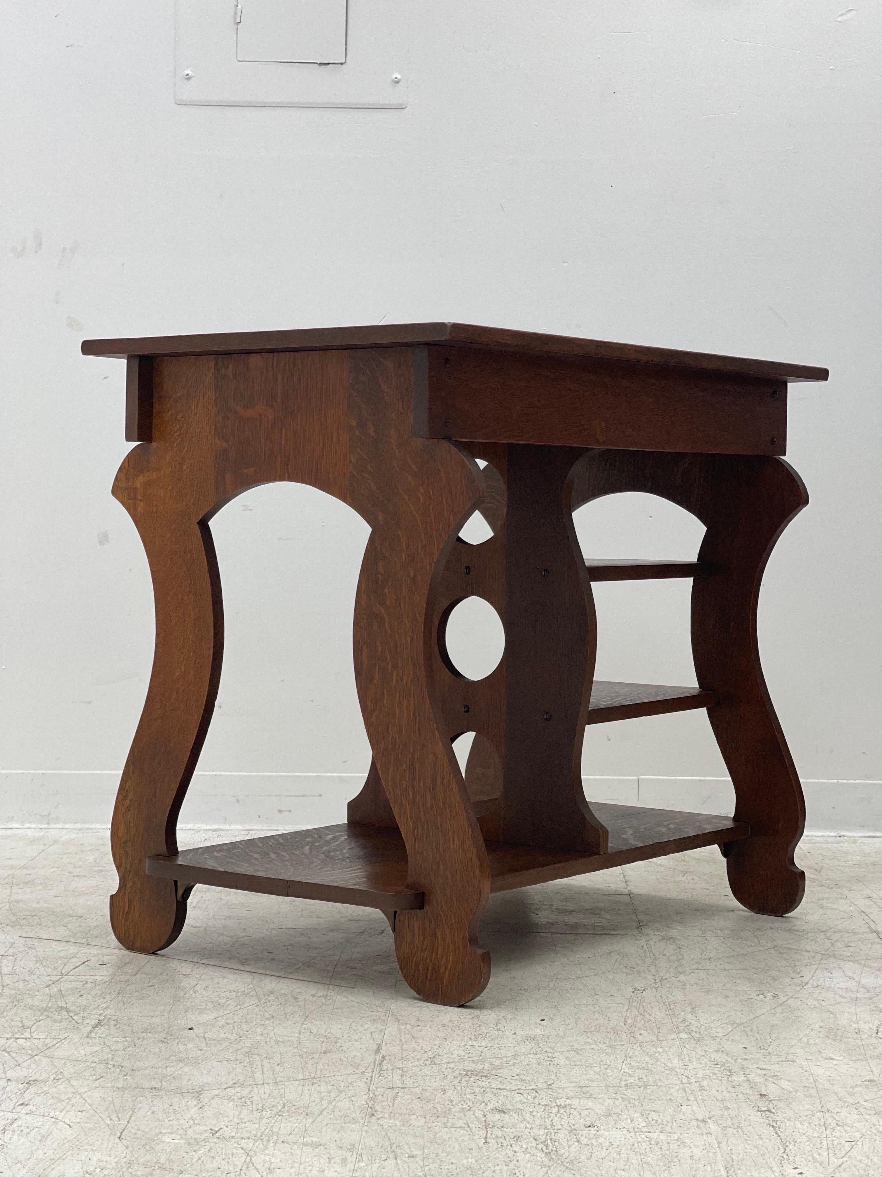 Vintage English import desk/console table with figured wood 

Dimensions. 34 W ; 29 1/2 H ; 22 D.