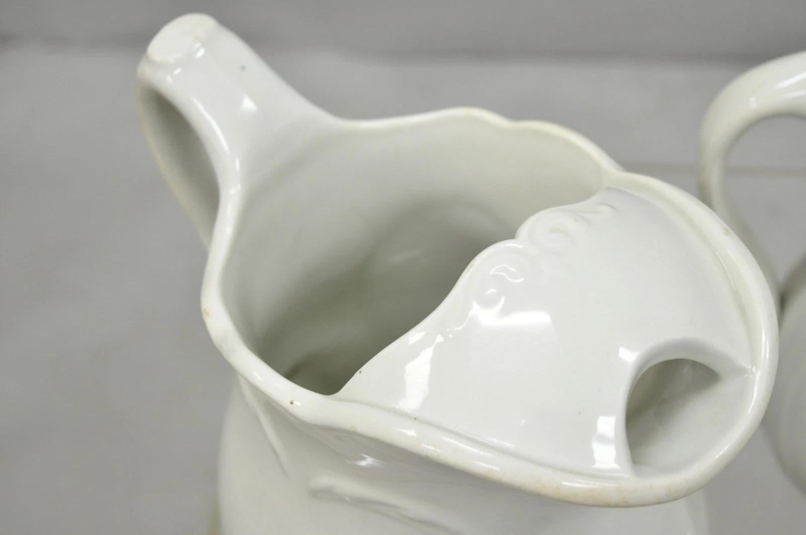 Vintage English Ironstone White Farmhouse Milk Water Pitchers - Set of 2 In Good Condition For Sale In Philadelphia, PA