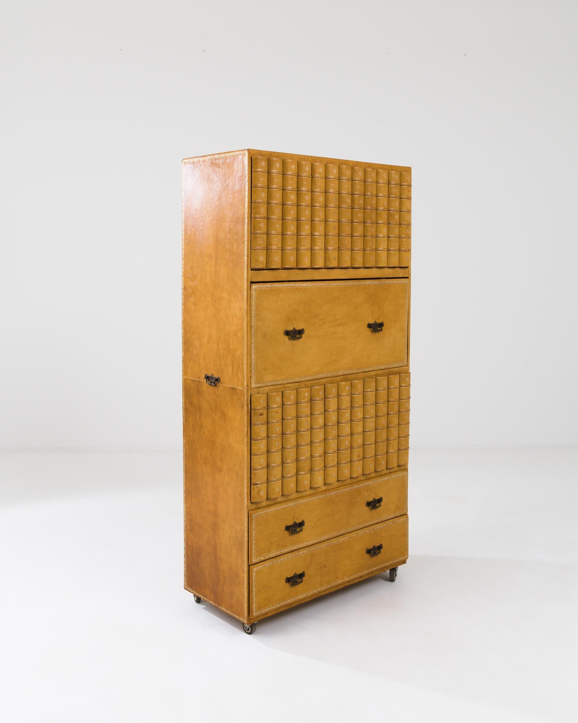 A wooden cabinet made in the UK during the 20th century. Composed of a series of collapsing doors, storage compartments, and drawers, this complex yet organized cabinet offers a chic display of utilitarian function. The gleaming book-bound surface