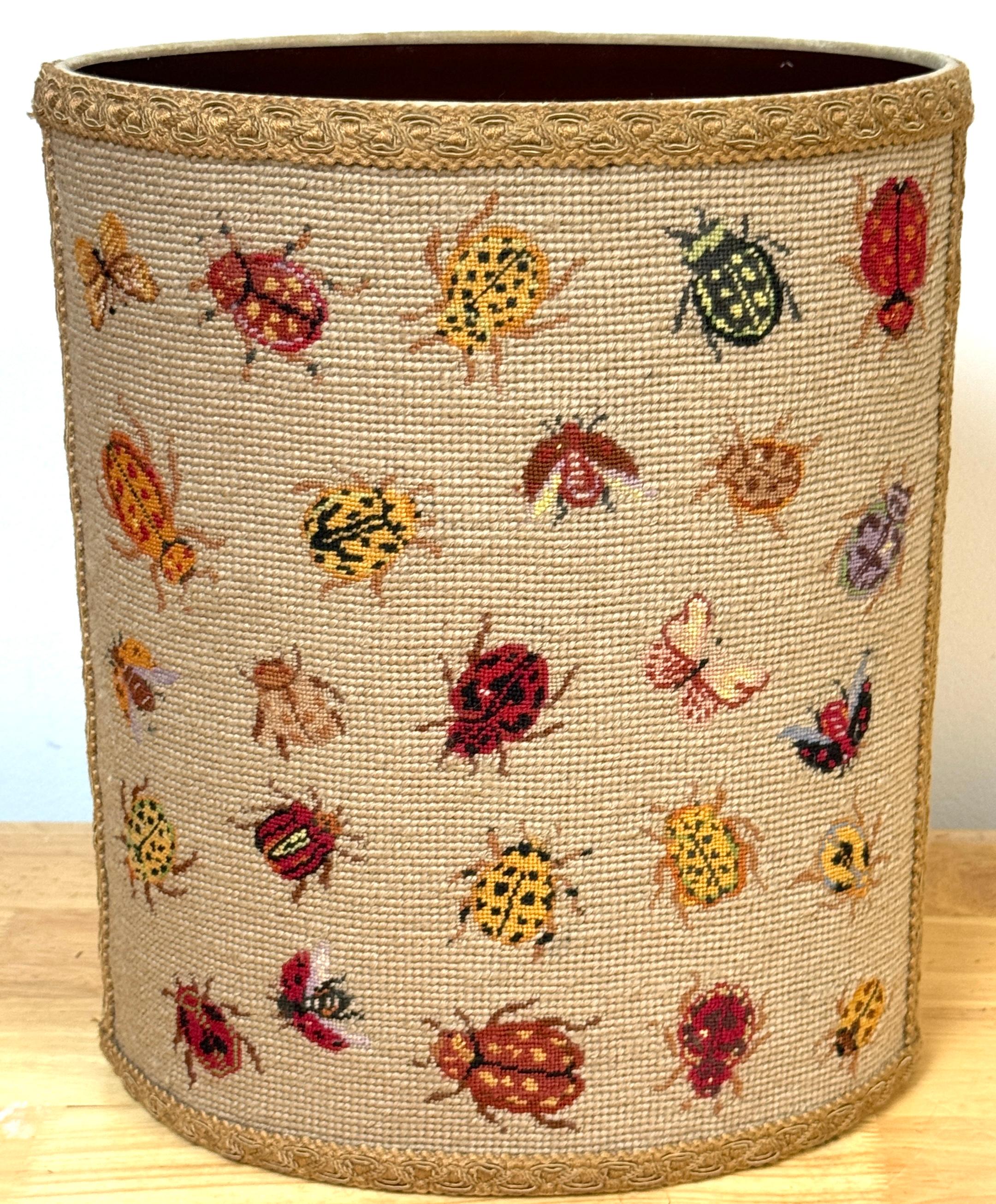 Vintage English Needlepoint Insect Motif Oval Wastepaper Basket/Trash Can, England, circa 1960s
A rare and charming vintage English needlepoint insect motif oval wastepaper basket dating back to the 1960s. This unique piece stands 13 inches high,
